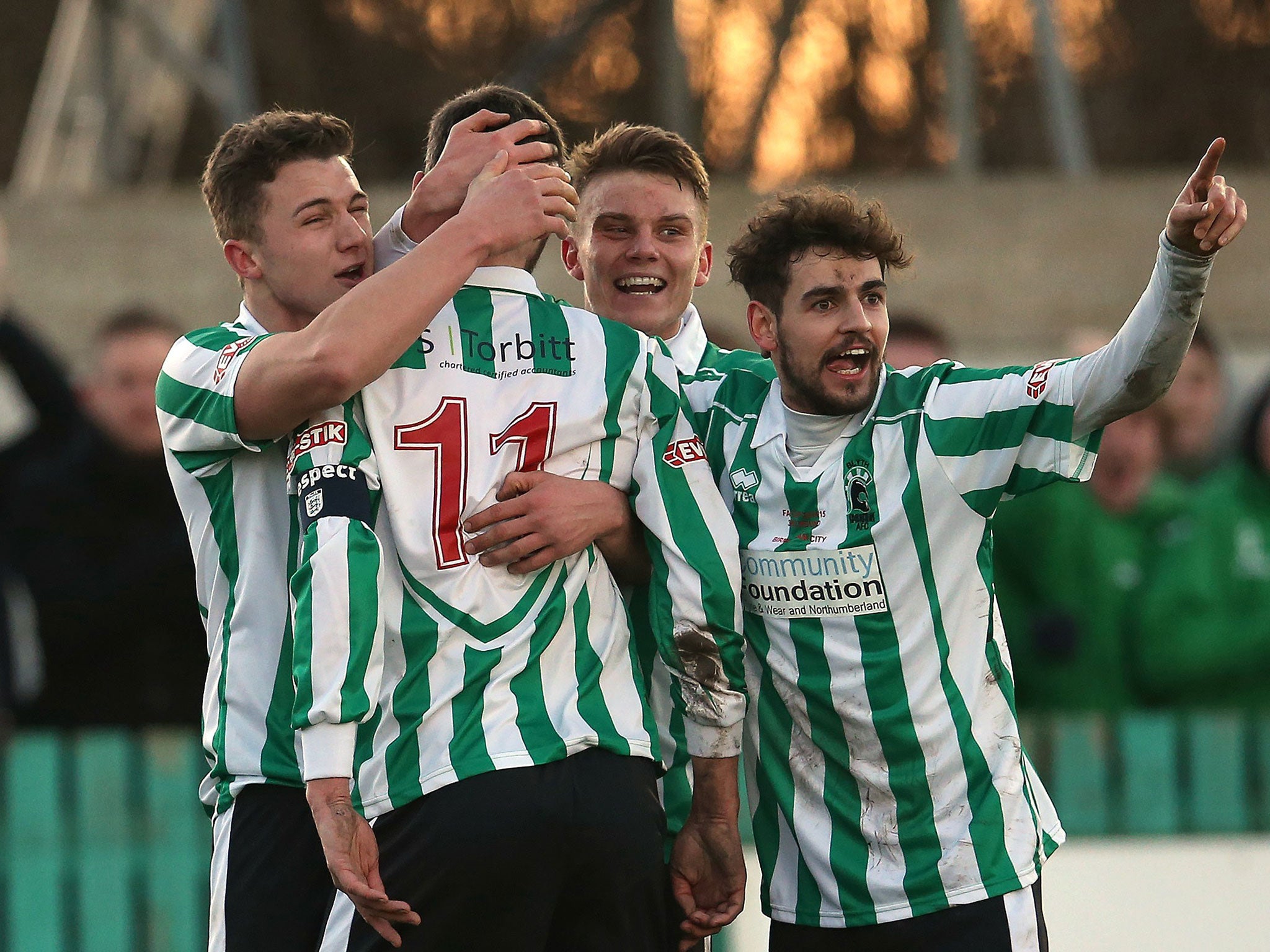 Blyth players celebrate Dale's opening goal