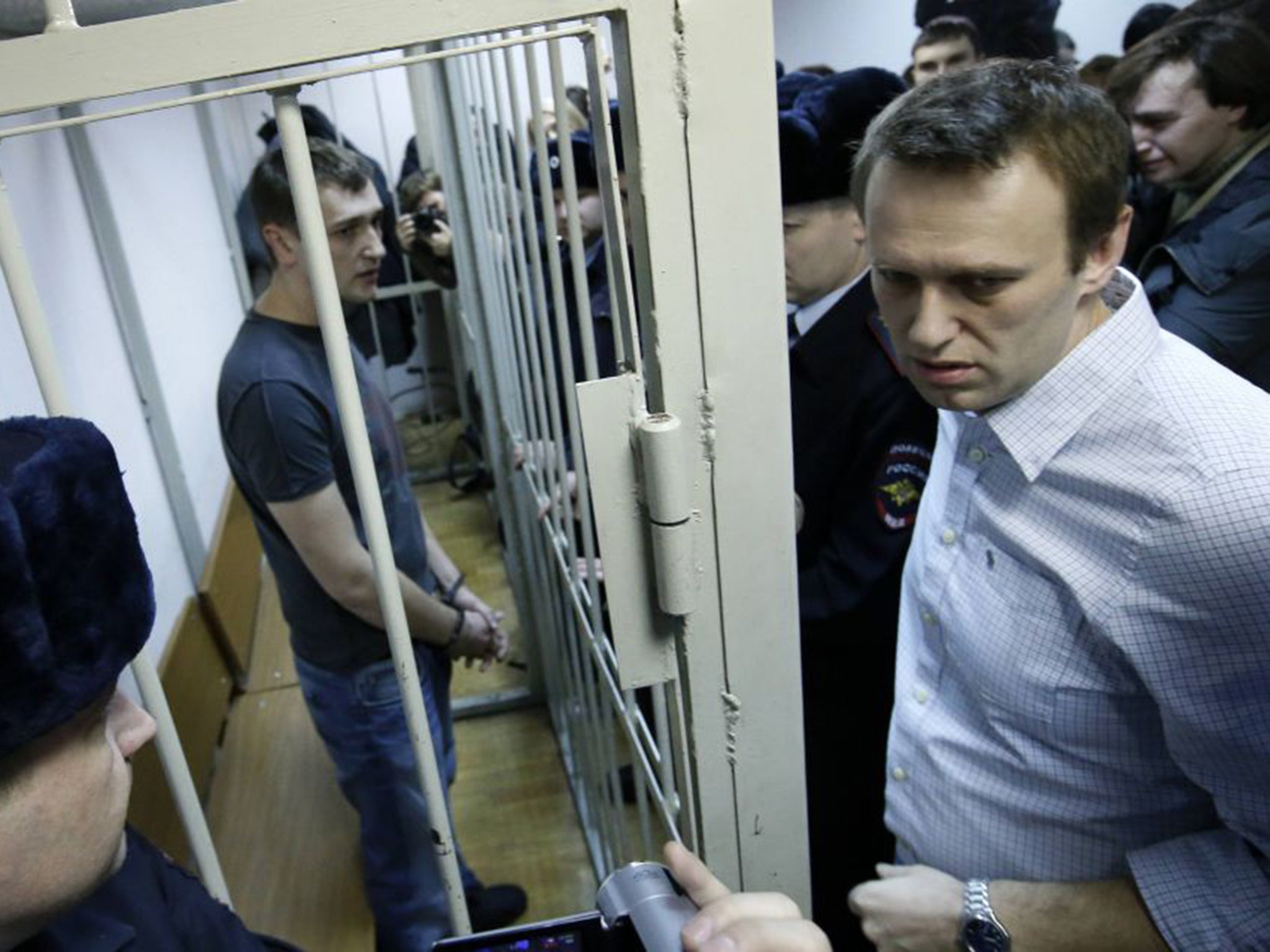 The conviction of Alexei Navalny, right, and his brother, Oleg