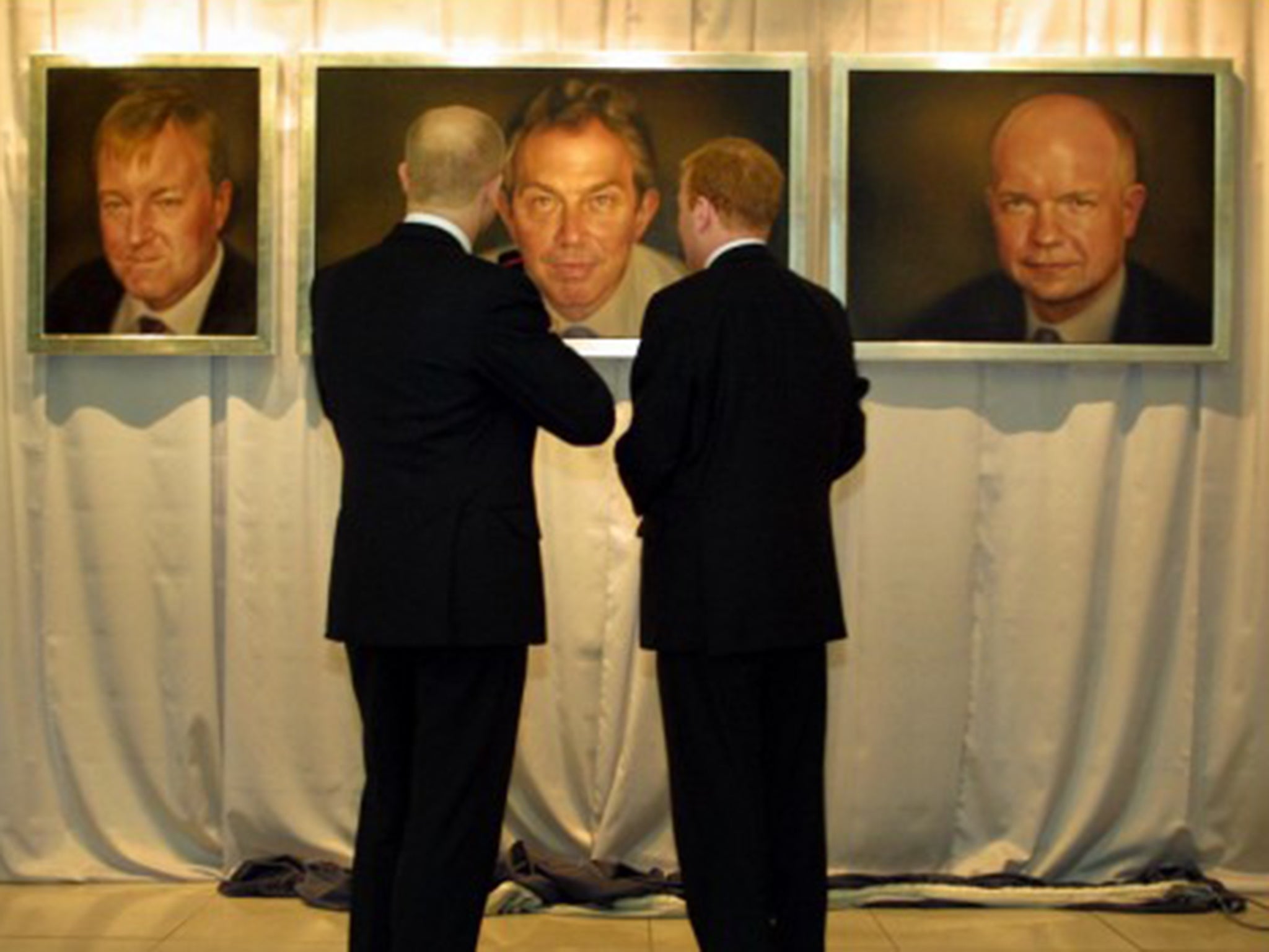 William Hague, left, and Charles Kennedy admire their portraits and that of Tony Blair. All were painted by Jonathan Yeo (David Sandison)