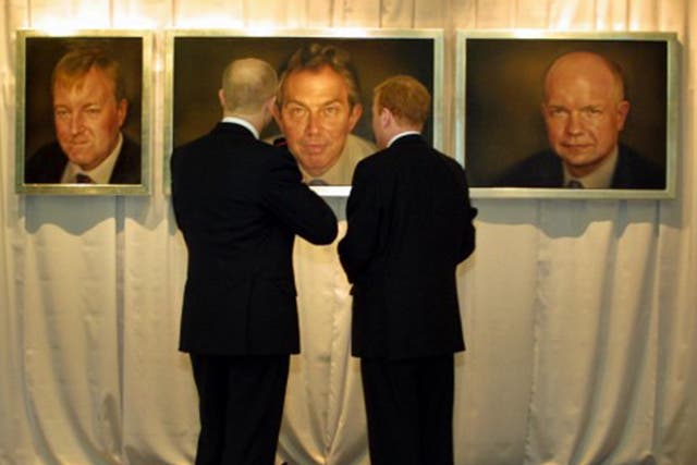 William Hague, left, and Charles Kennedy admire their portraits and that of Tony Blair. All were painted by Jonathan Yeo (David Sandison)