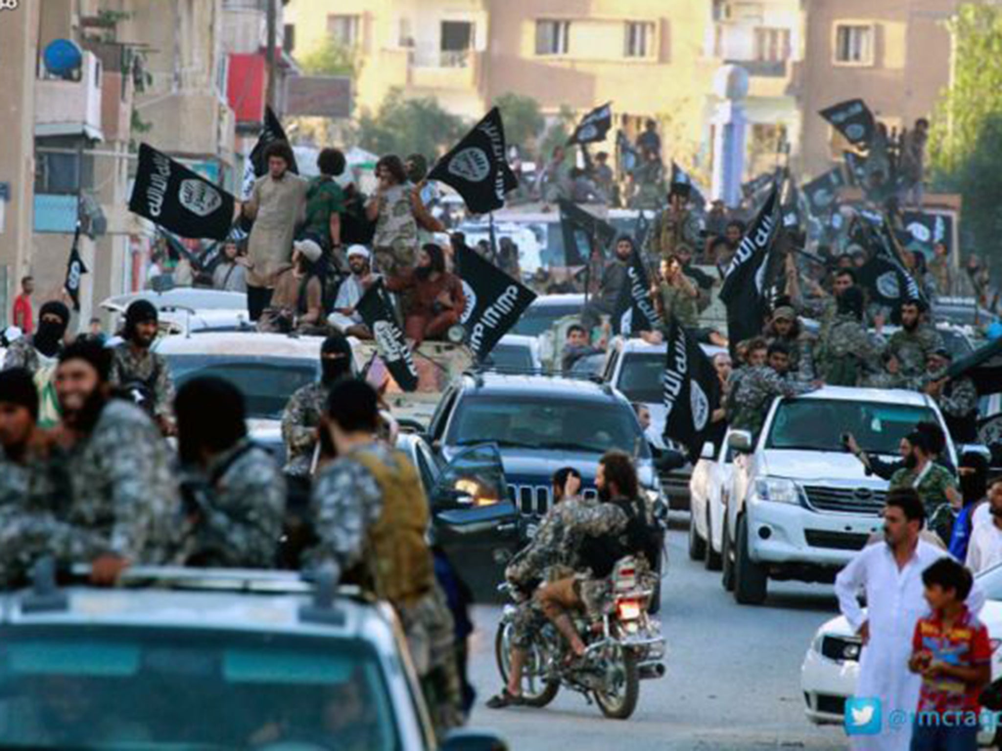 Islamic State fighters in Raqqa (AP)