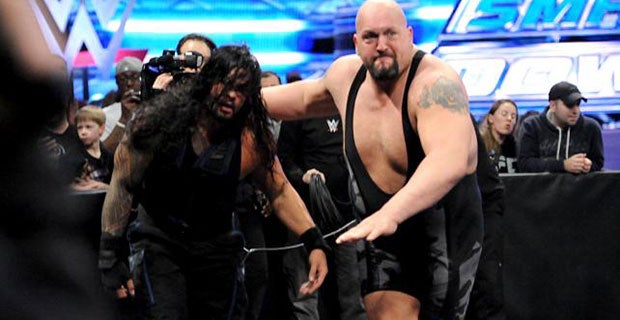 Big Show attacks Roman Reigns during his main event match with Rusev