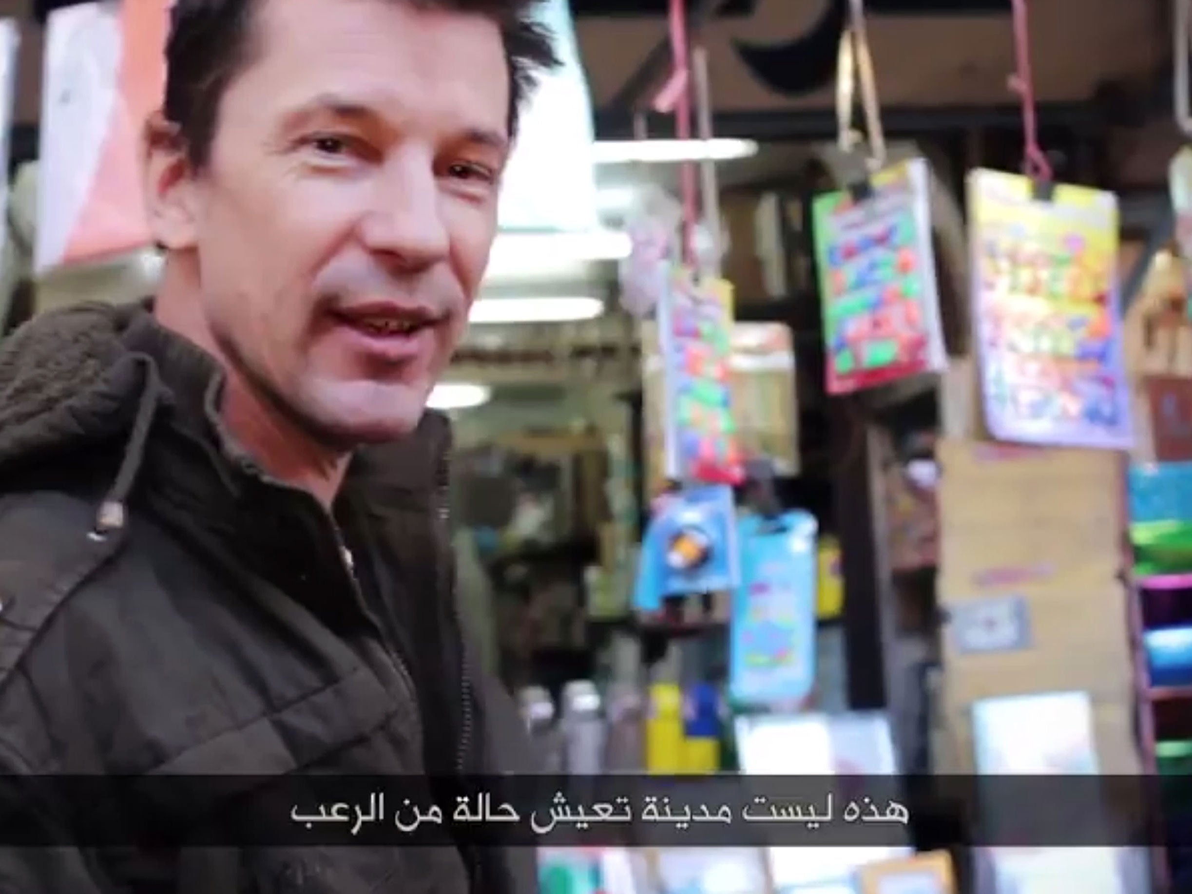 Undated video grab taken from YouTube believed to be of John Cantlie, which Islamic State (IS) have released purportedly showing him giving a tour of the Iraqi city Mosul.