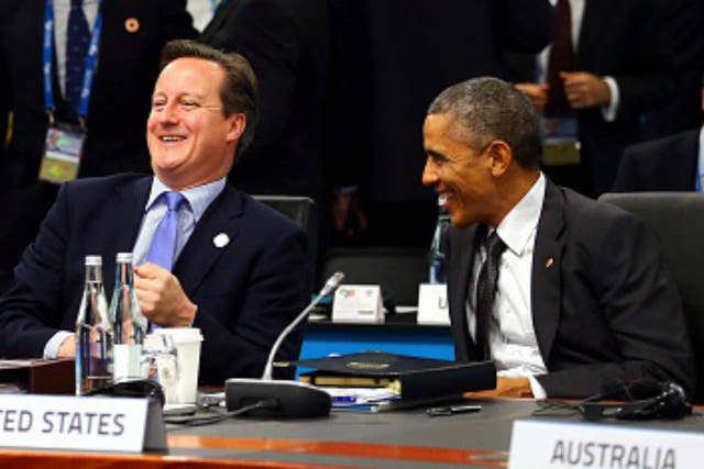 Cameron and Obama chuckling at the G20 Summit in 2014