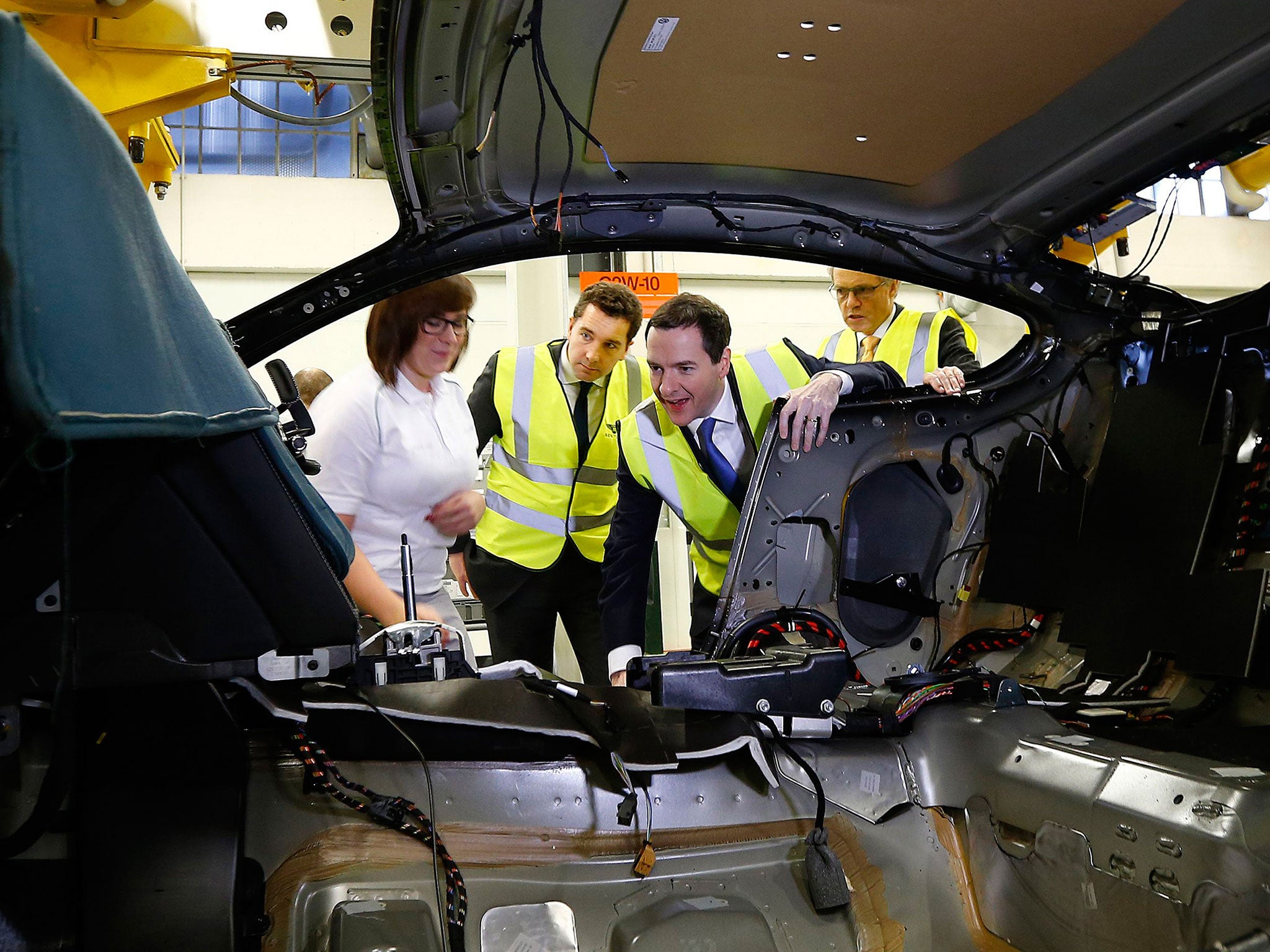 The Chancellor, George Osborne, visiting a production line last month: productivity has been disappointing in the economy as a whole