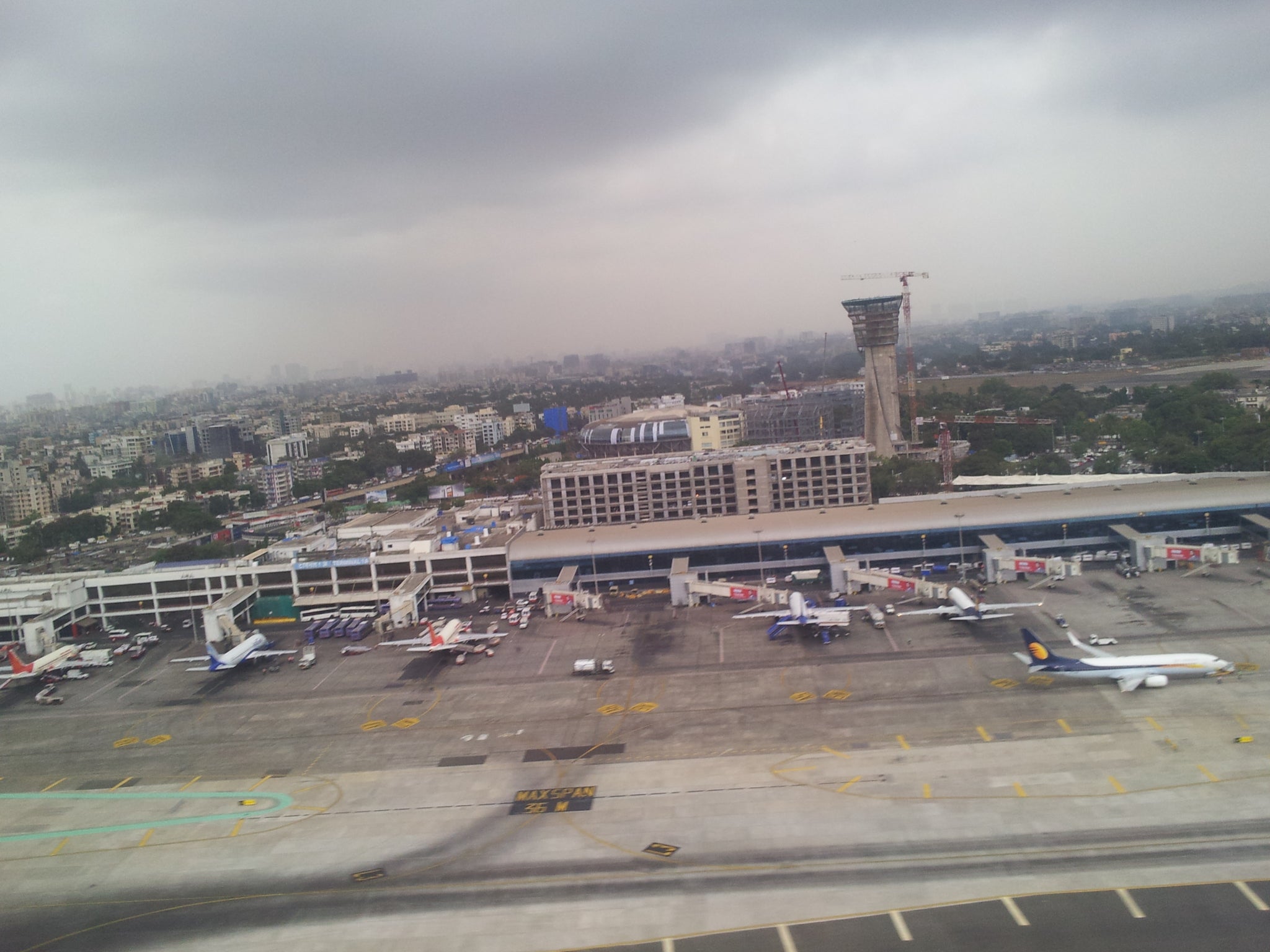 Mumbai airport runway and terminal building from the air