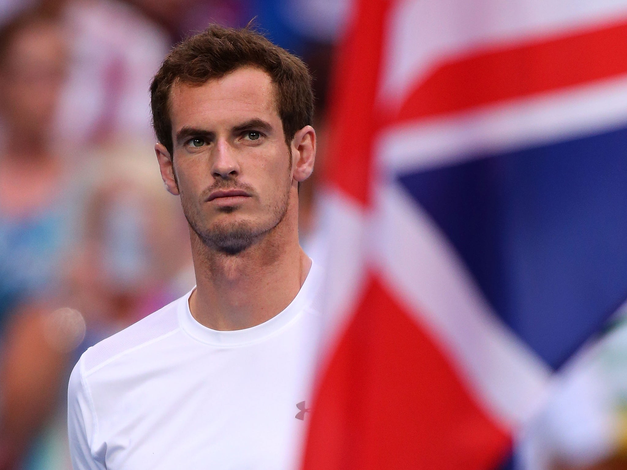 Andy Murray of Great Britain looks on as the national anthems are played prior to his singles match against Benoit Paire of France during day two of the 2015 Hopman Cup