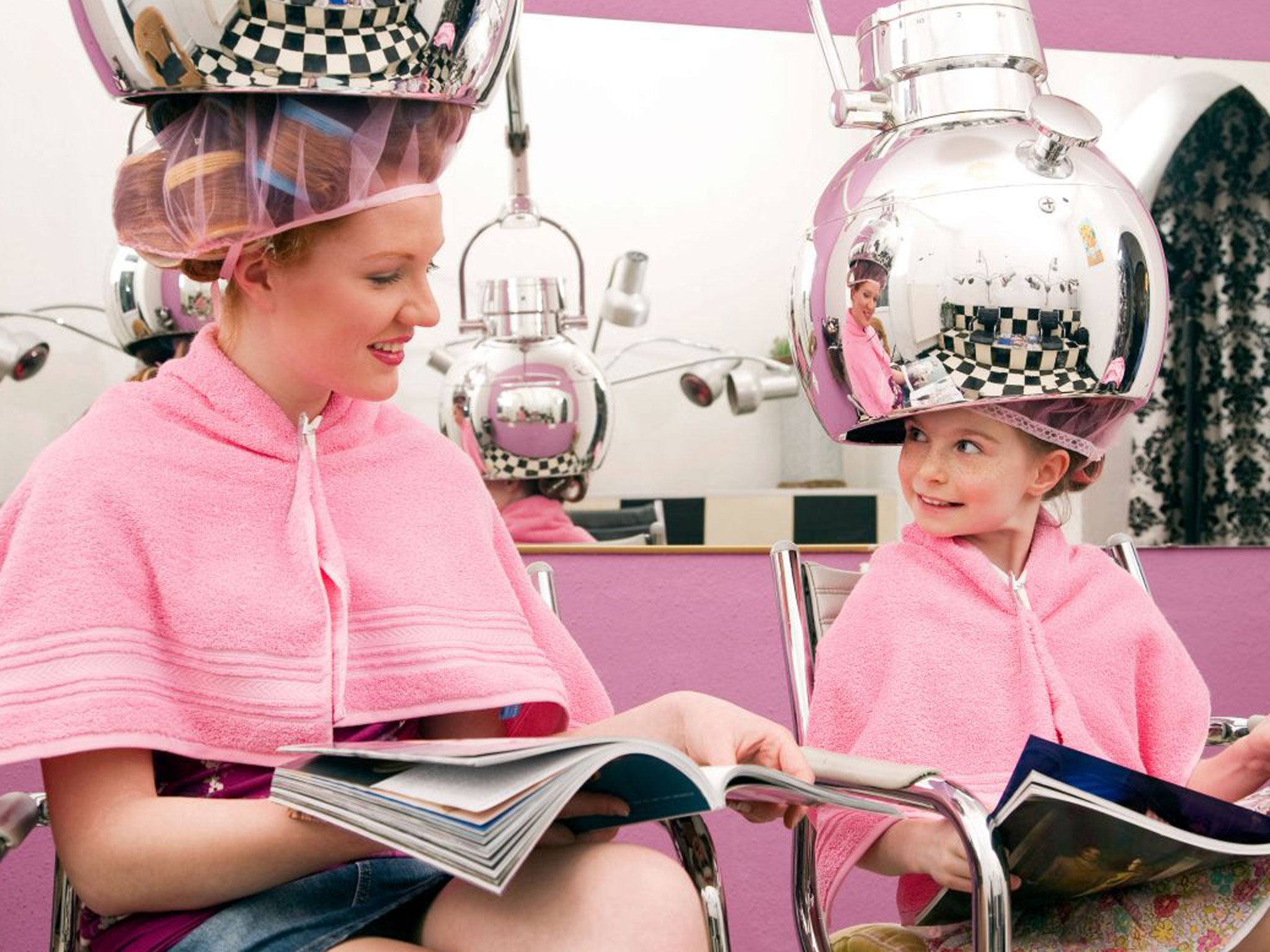 A young woman and little girl at a hair salon