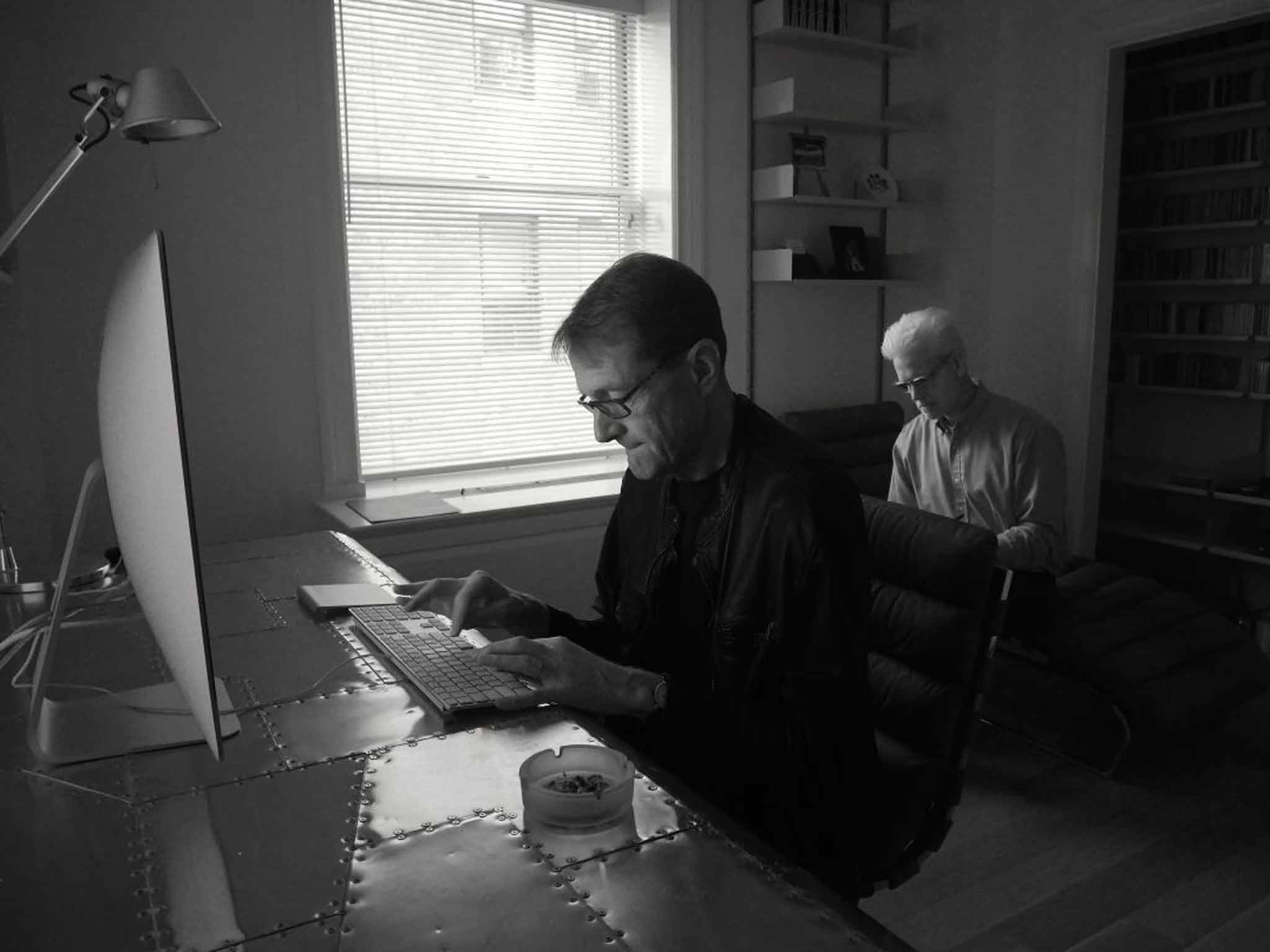 Novel approach: Andy Martin observes quietly in the background while Lee Child works on his latest book