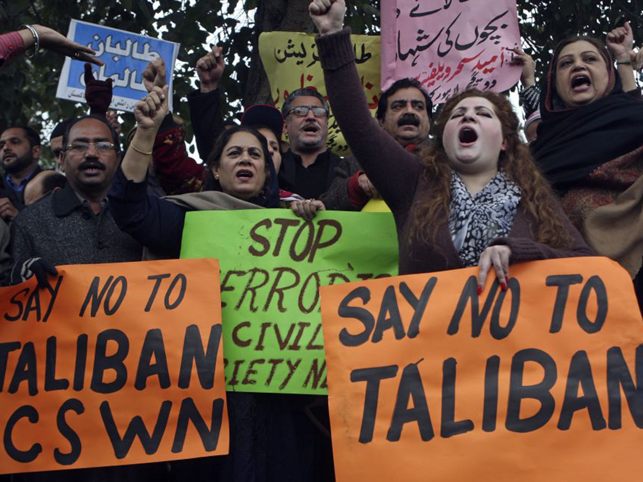 Pakistani civil society activists shout slogans against the Taliban during a peace rally on January 5th in Lahore (AP)