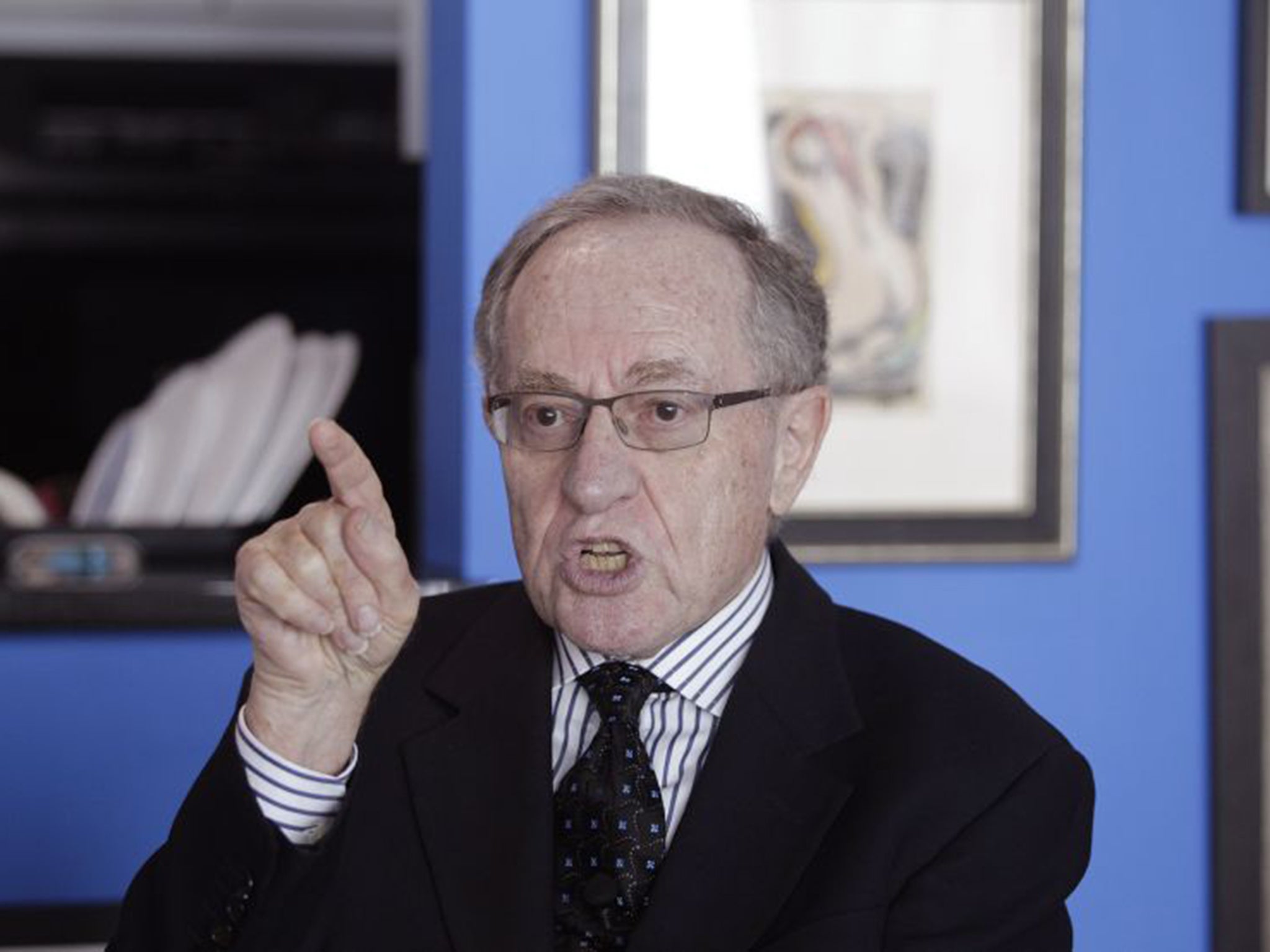 Alan Dershowitz discussed the allegations levelled against him during an interview at his home in Miami on Monday (Reuters)