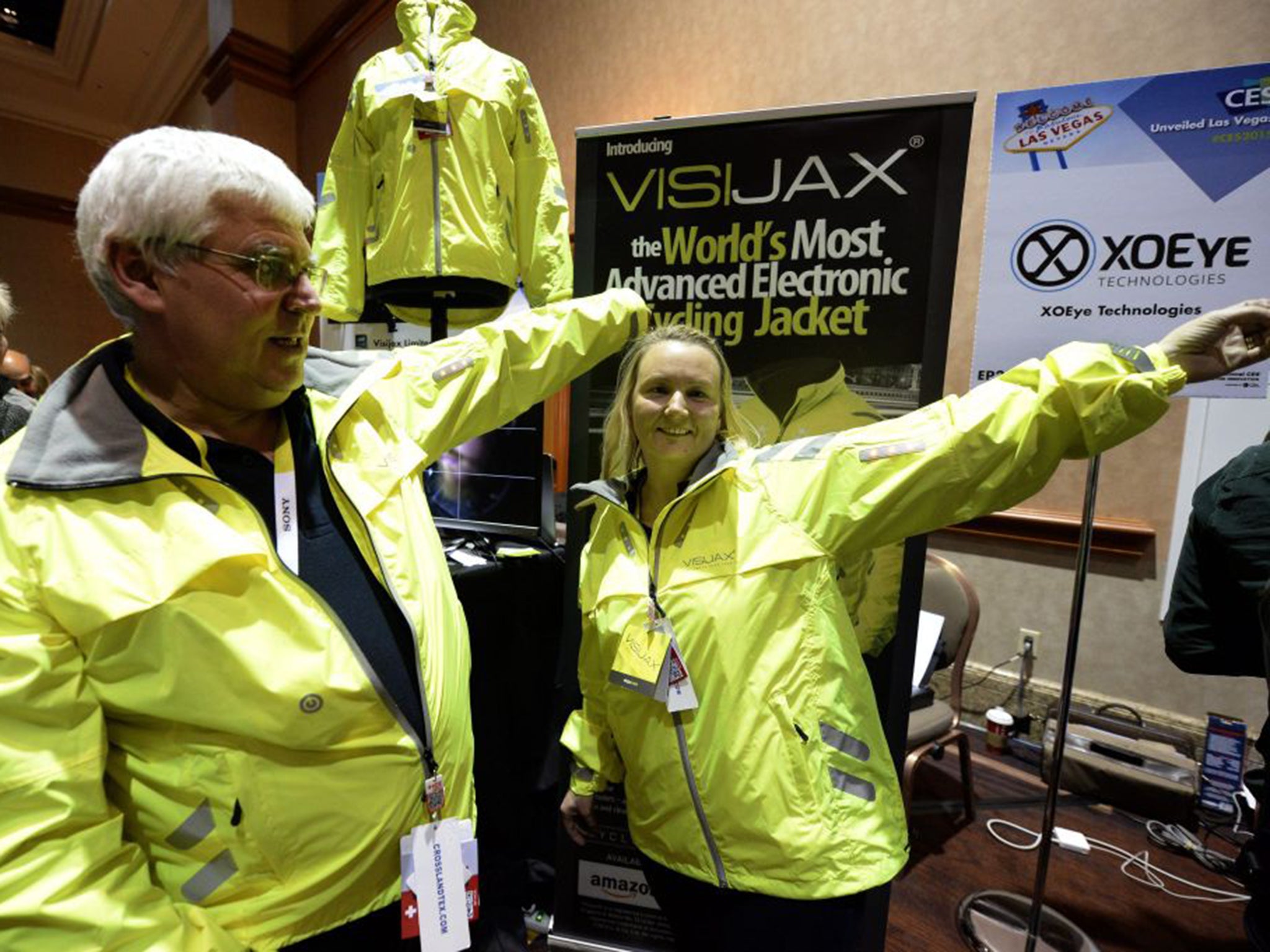 Mark Bernstein and Angela Cairns from British firm Wearable Technologies show their electronic cycling jacket in Las Vegas