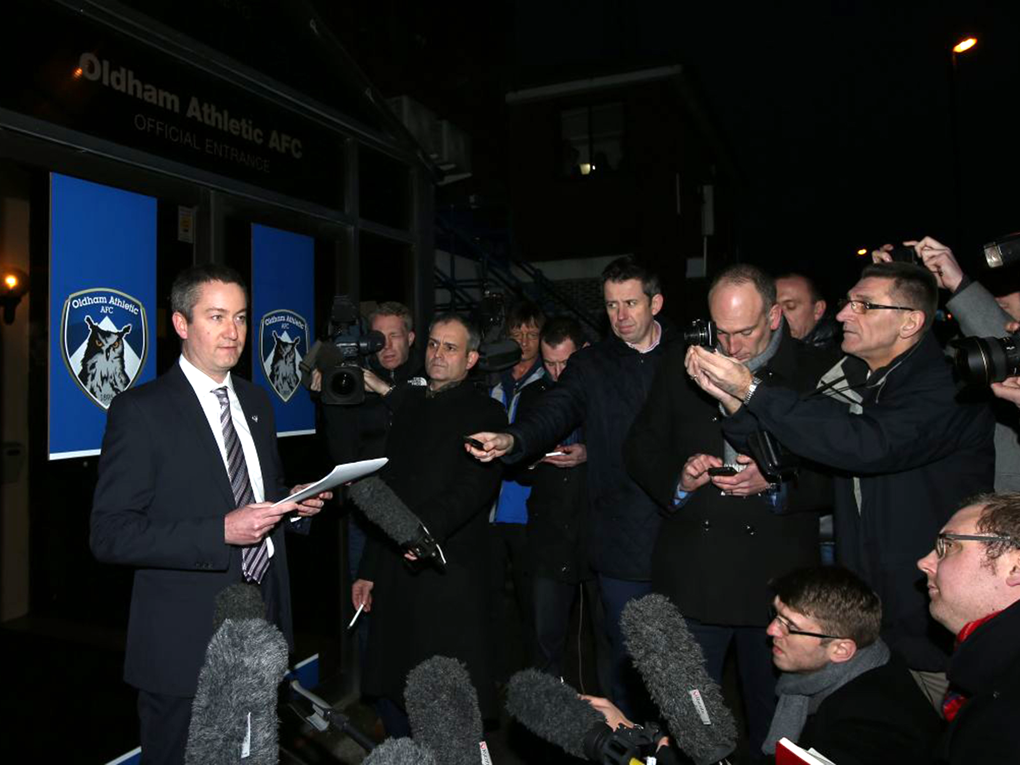 Oldham Athletic’s chief executive, Neil Joy, reads out a statement at Boundary Park on Monday (Getty)