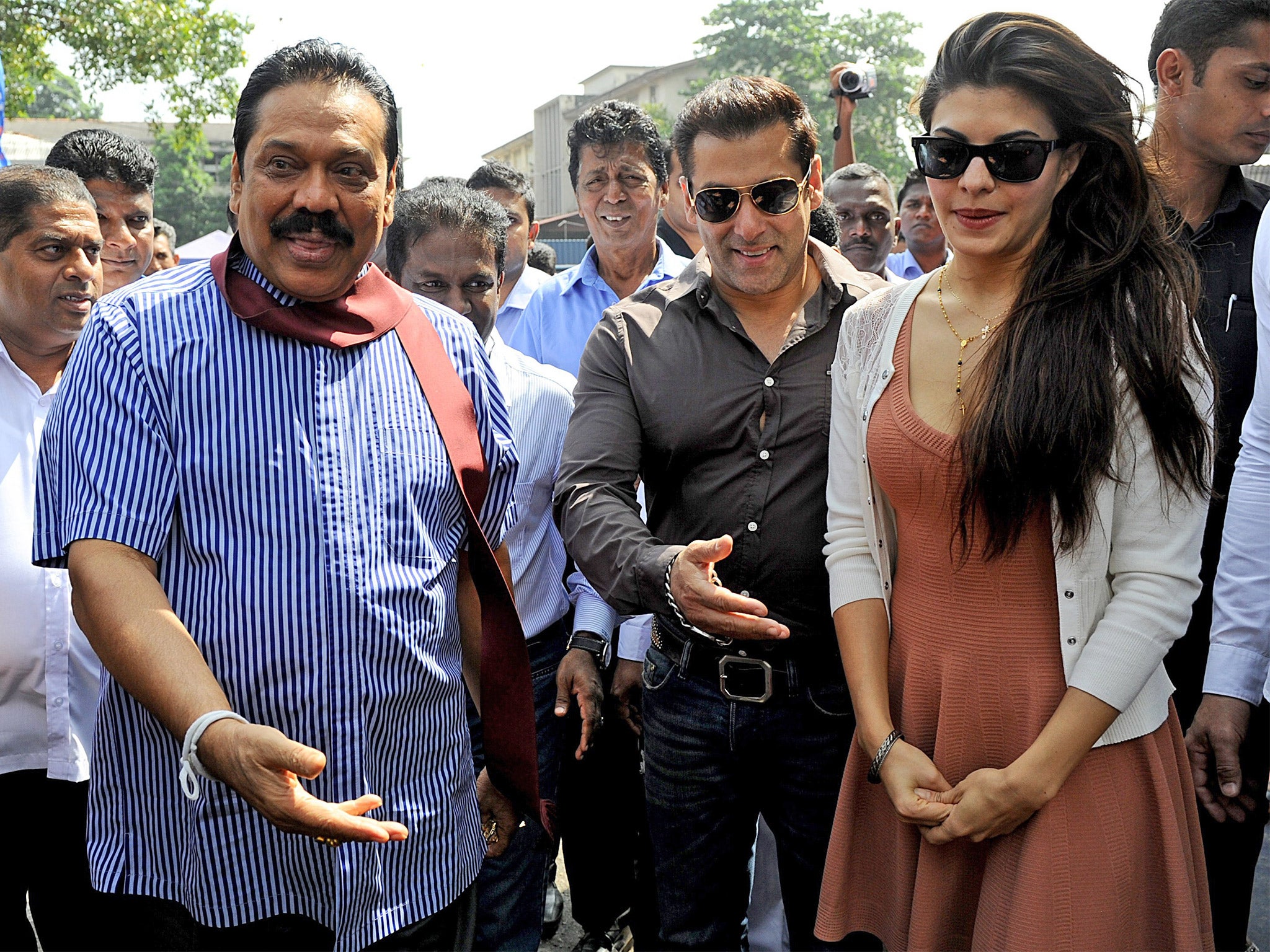 Mahinda Rajapaksa (left) with Bollywood supporters Salman Khan and Jacqueline Fernandez