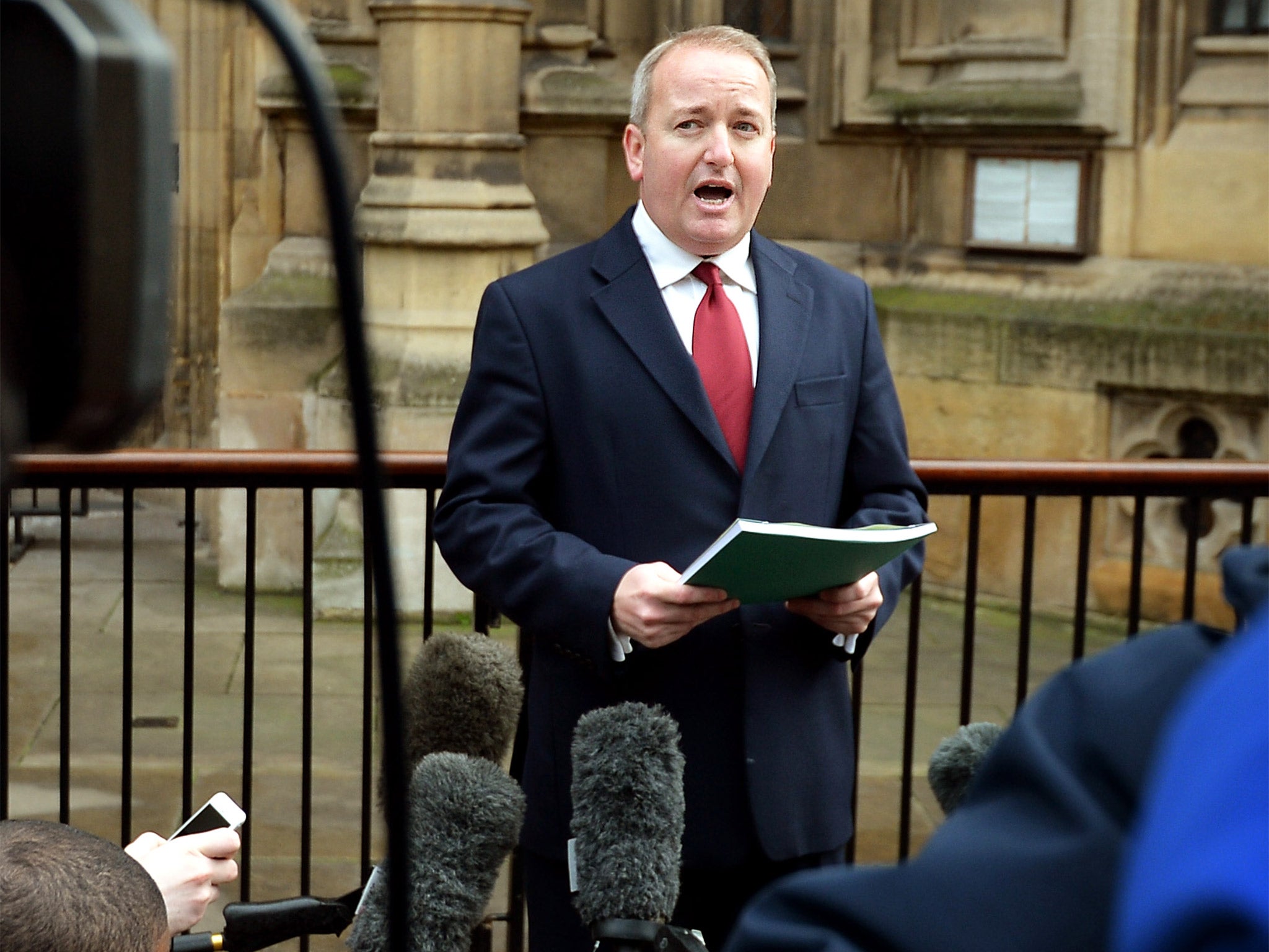 Conservative MP Mark Pritchard reads a statement outside the Houses of Parliament, after the Metropolitan Police dropped an investigation into rape claims against him due to insufficient evidence