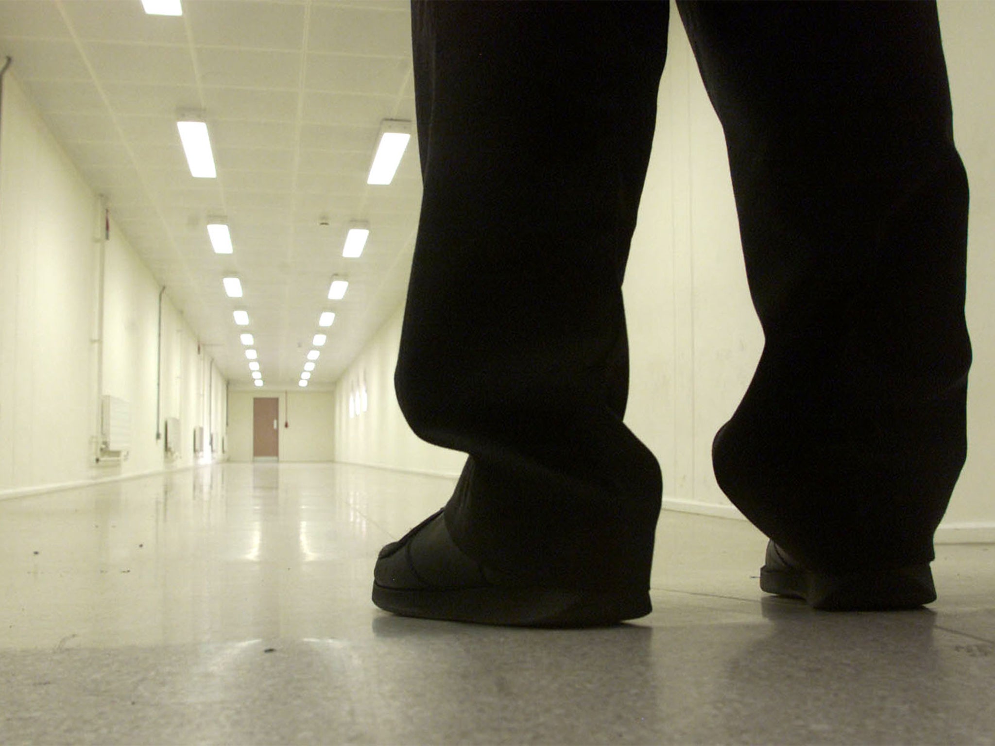A security officer walks down one of the corridors of Yarl's Wood Immigration Removal Centre