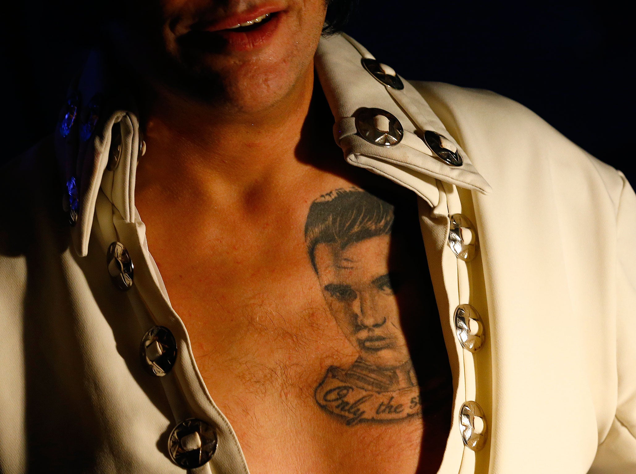 Competitor sports a tattoo of Elvis Presley at annual European Elvis Tribute Artist Contest and Convention in Birmingham