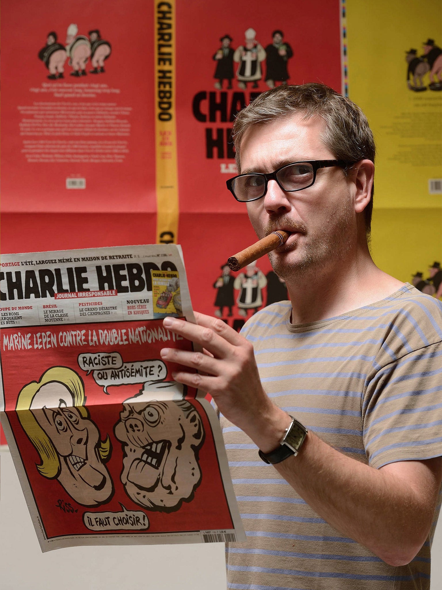 Editor Stéphane Charbonnier had previously received death threats (AFP)