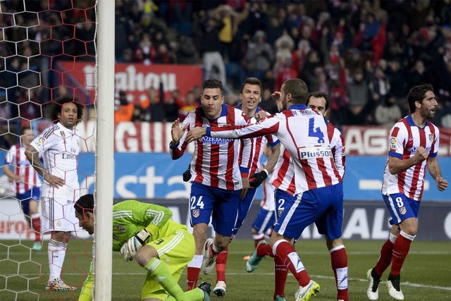 Atletico Madrid's Jose Gimenez celebrates after doubling his side's lead