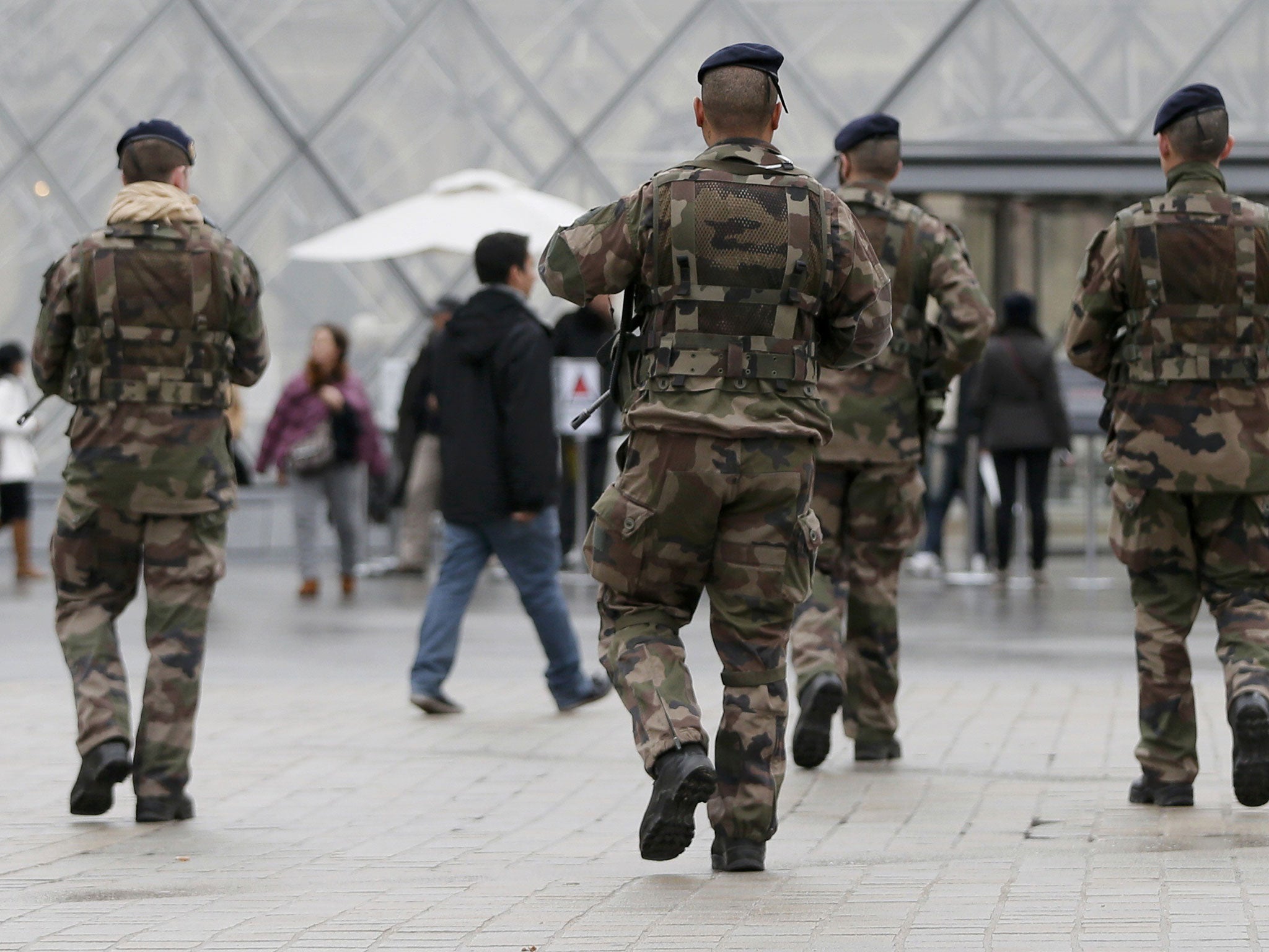 Troops patrol in Paris the day after the terror attack at Charlie hebdo's offices