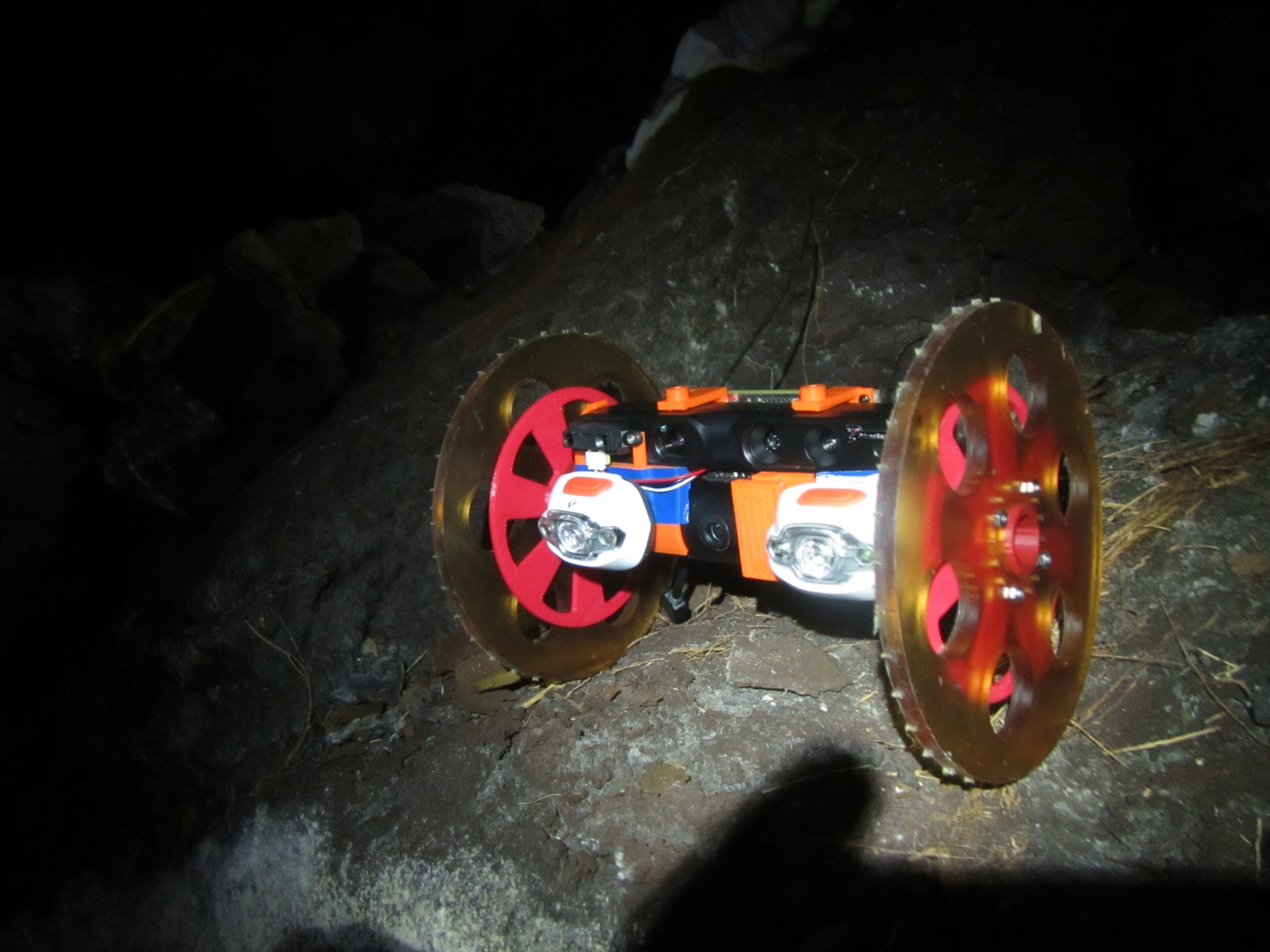 VolcanoBot 1, shown here in a lava tube — a structure formed by lava — explored the Kilauea volcano in Hawaii in May 2014. The robot is enabling researchers at NASA's Jet Propulsion Laboratory to put together a 3-D map of the fissure