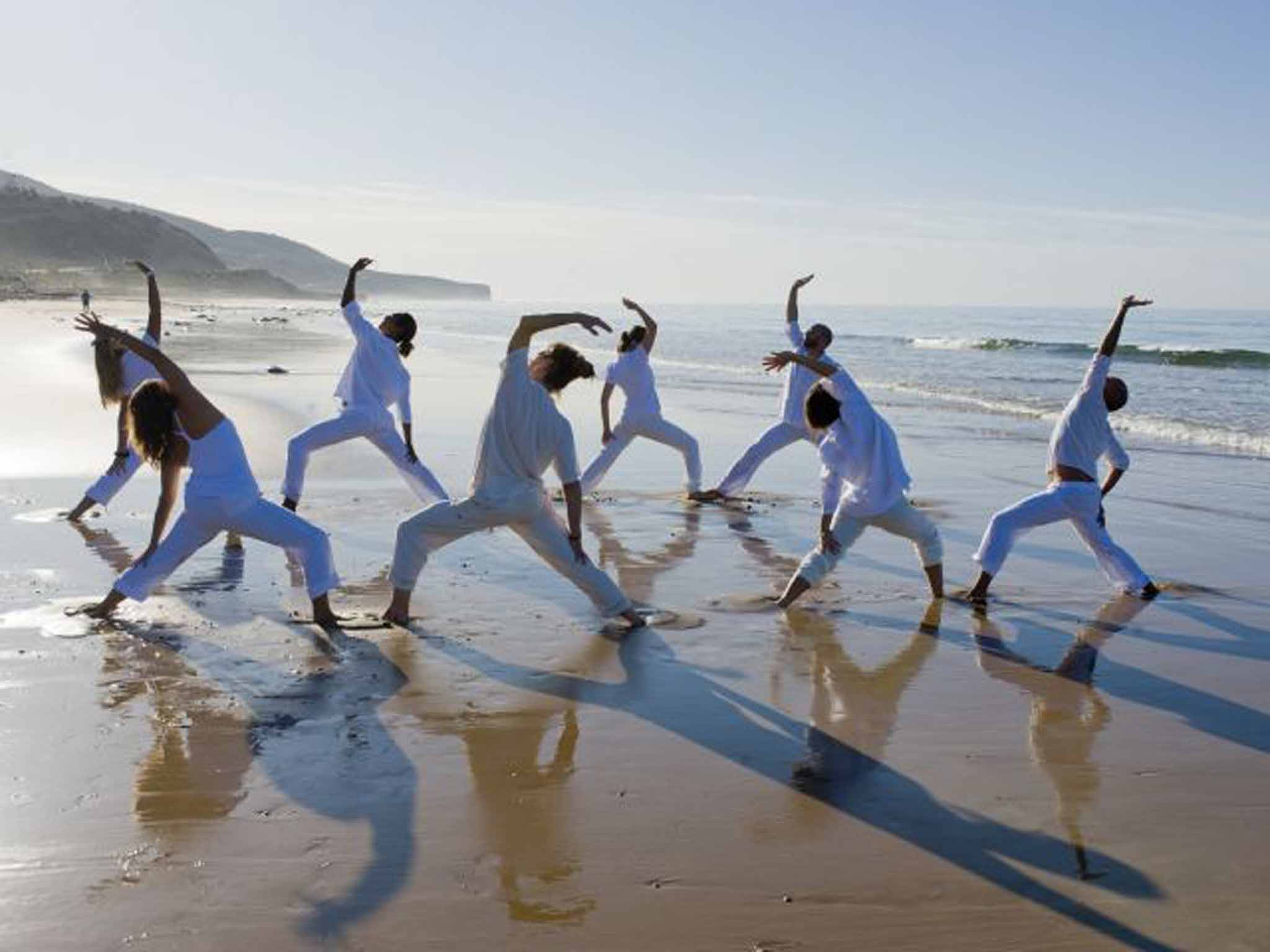 Sandy stretch: yoga at Paradis Plage