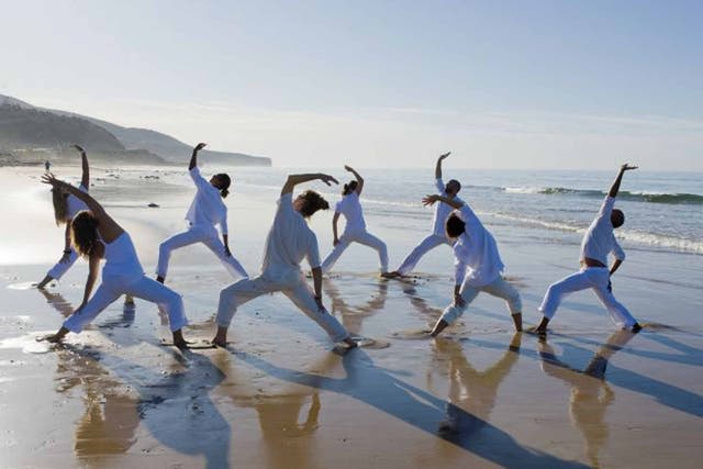 Sandy stretch: yoga at Paradis Plage