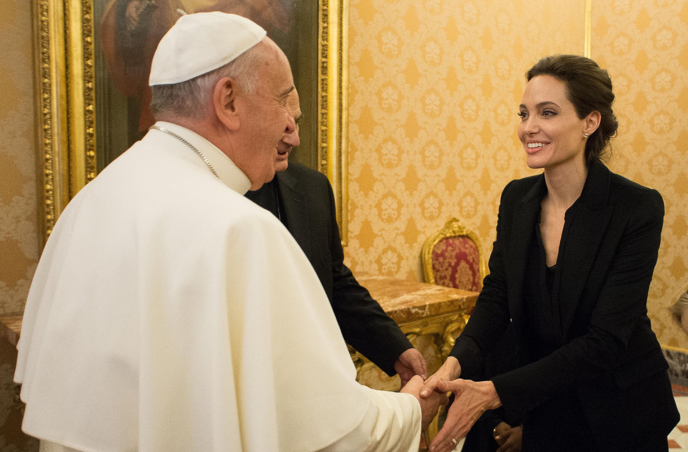 Jolie greets the pontiff on her official visit