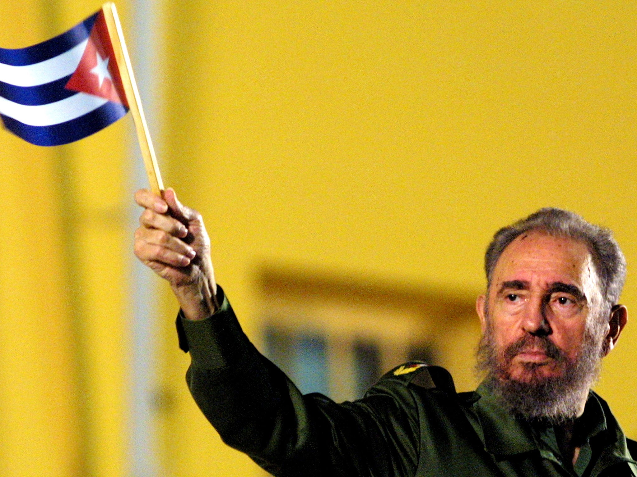Fidel Castro waving the Cuban flag