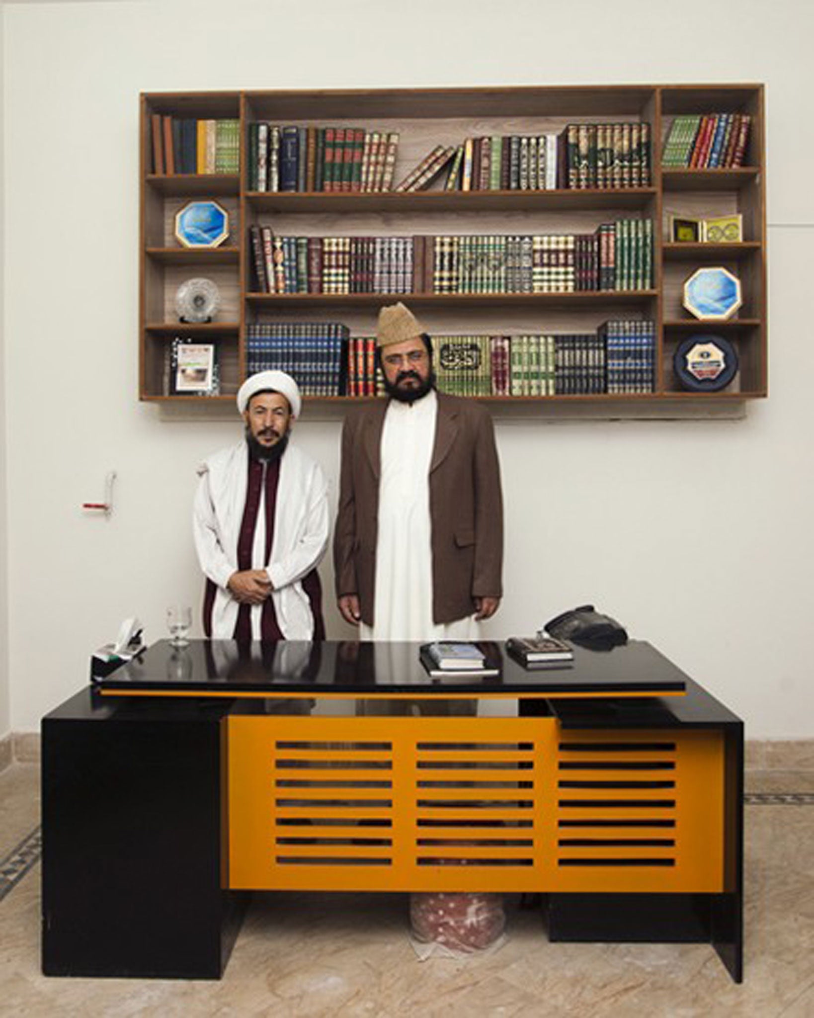 Allama Syed Ziaullah Shah Bukhari (on the right), a Muslim scholar who specialises in the implementation of Islamic law