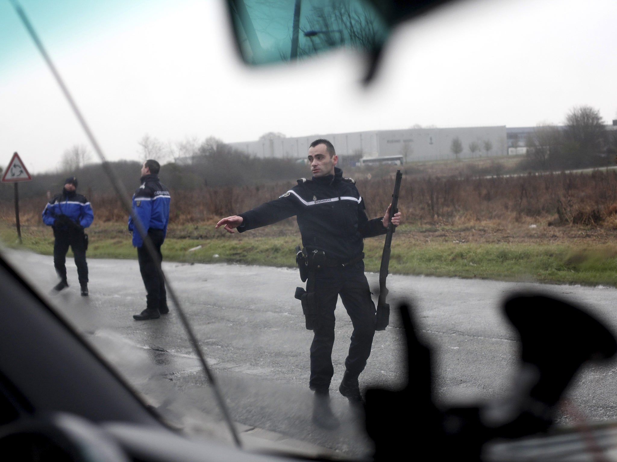 A gendarme blocks the access to Dammartin-en-Goele, northeast of Paris