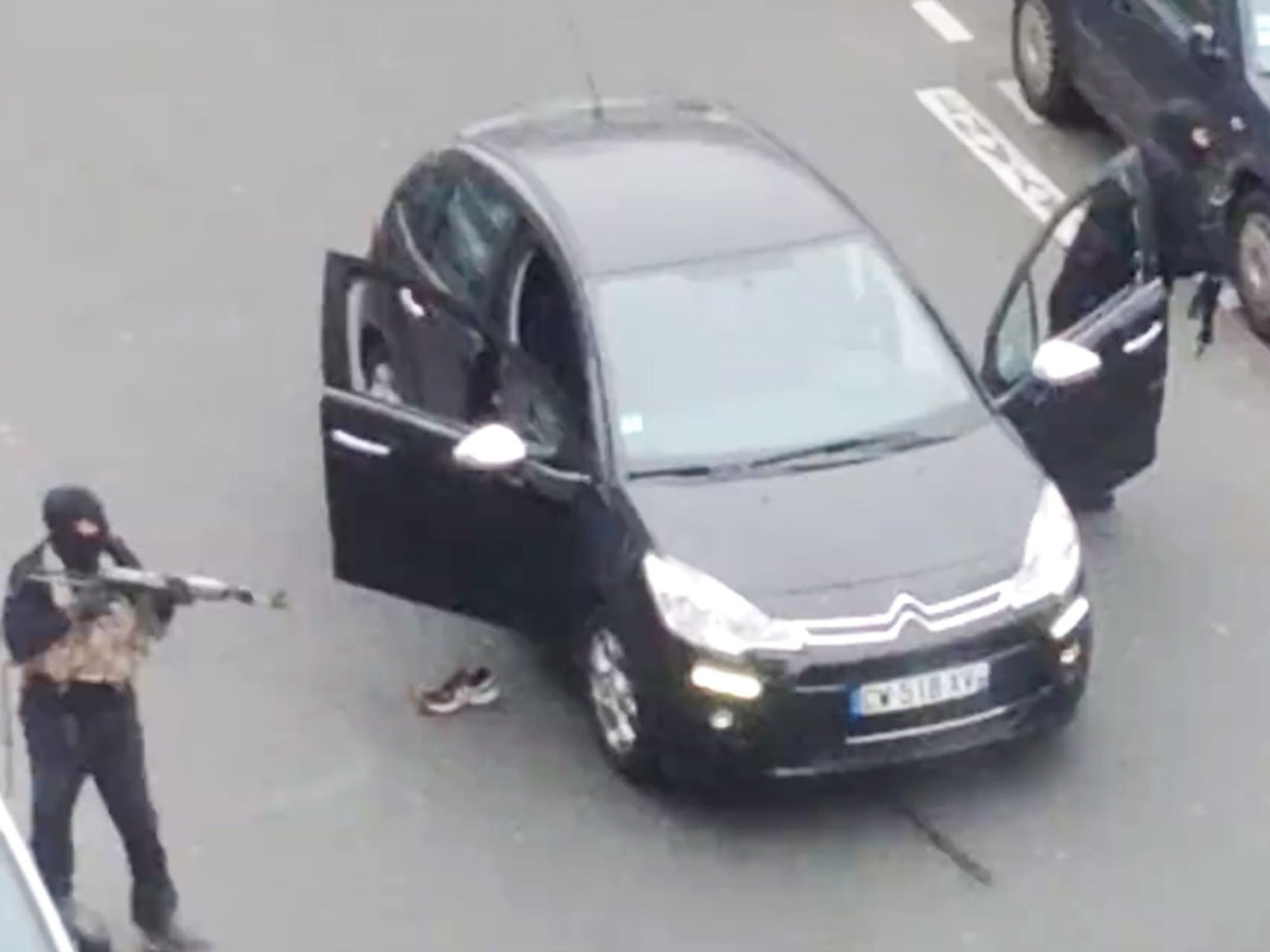 The gun men step out of the car before their attack on the Charlie Hebdo offices