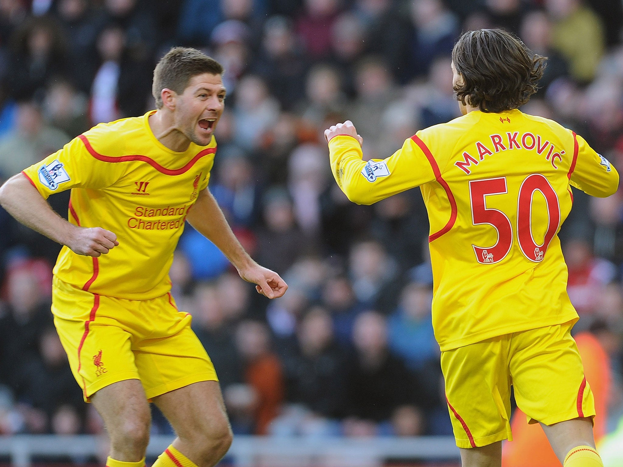 Gerrard celebrates with Markovic
