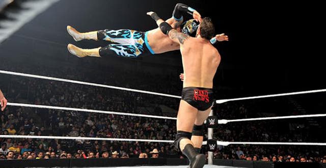 Sin Cara in action, showcasing his high-flying skills