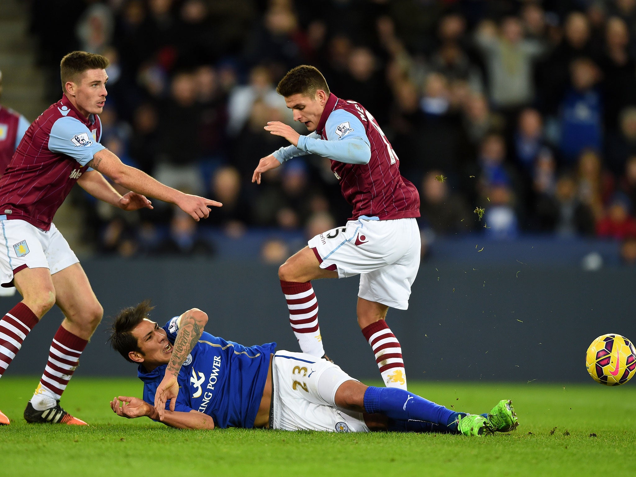 Leonardo Ulloa slides in on Ashley Westwood