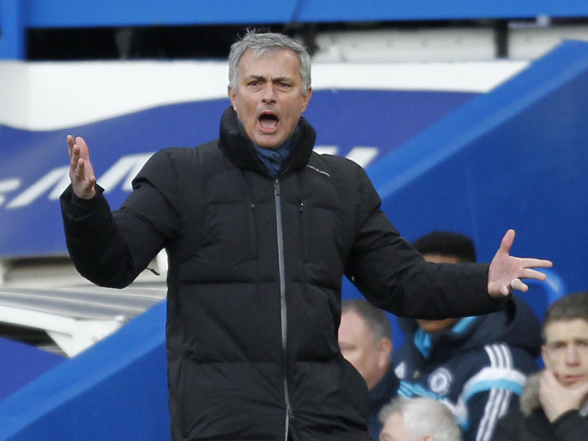 Jose Mourinho watches the action at Stamford Bridge