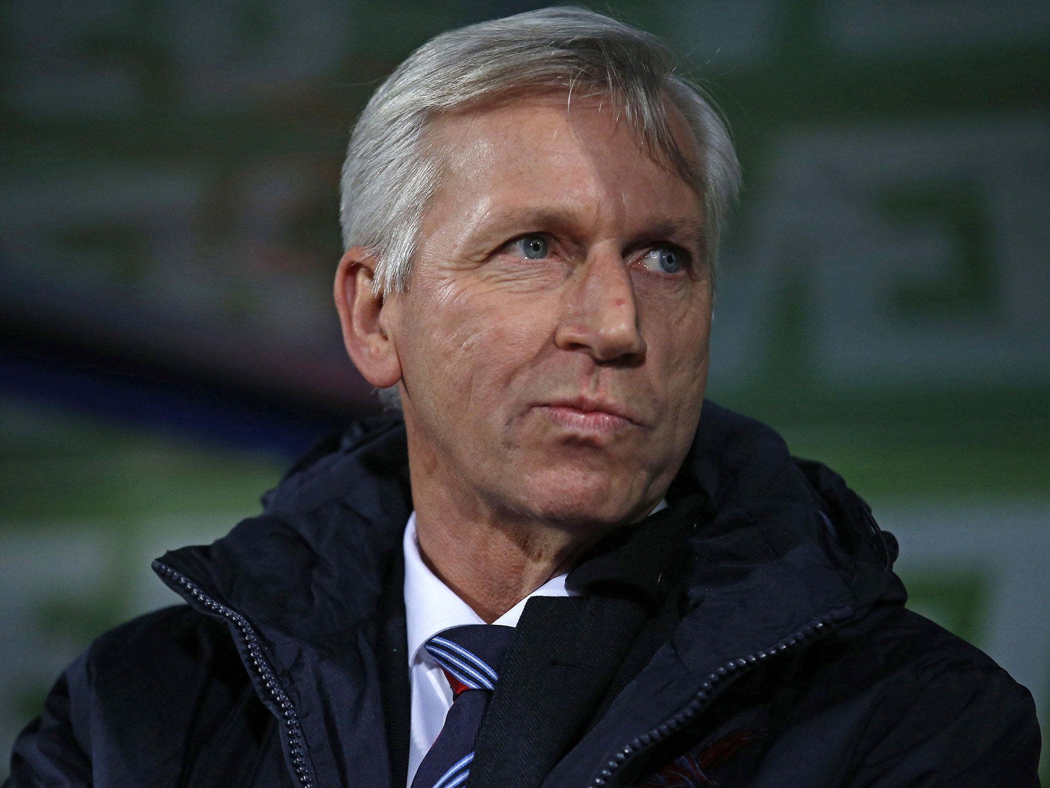 New Crystal Palace manager Alan Pardew watches on from the dug-out