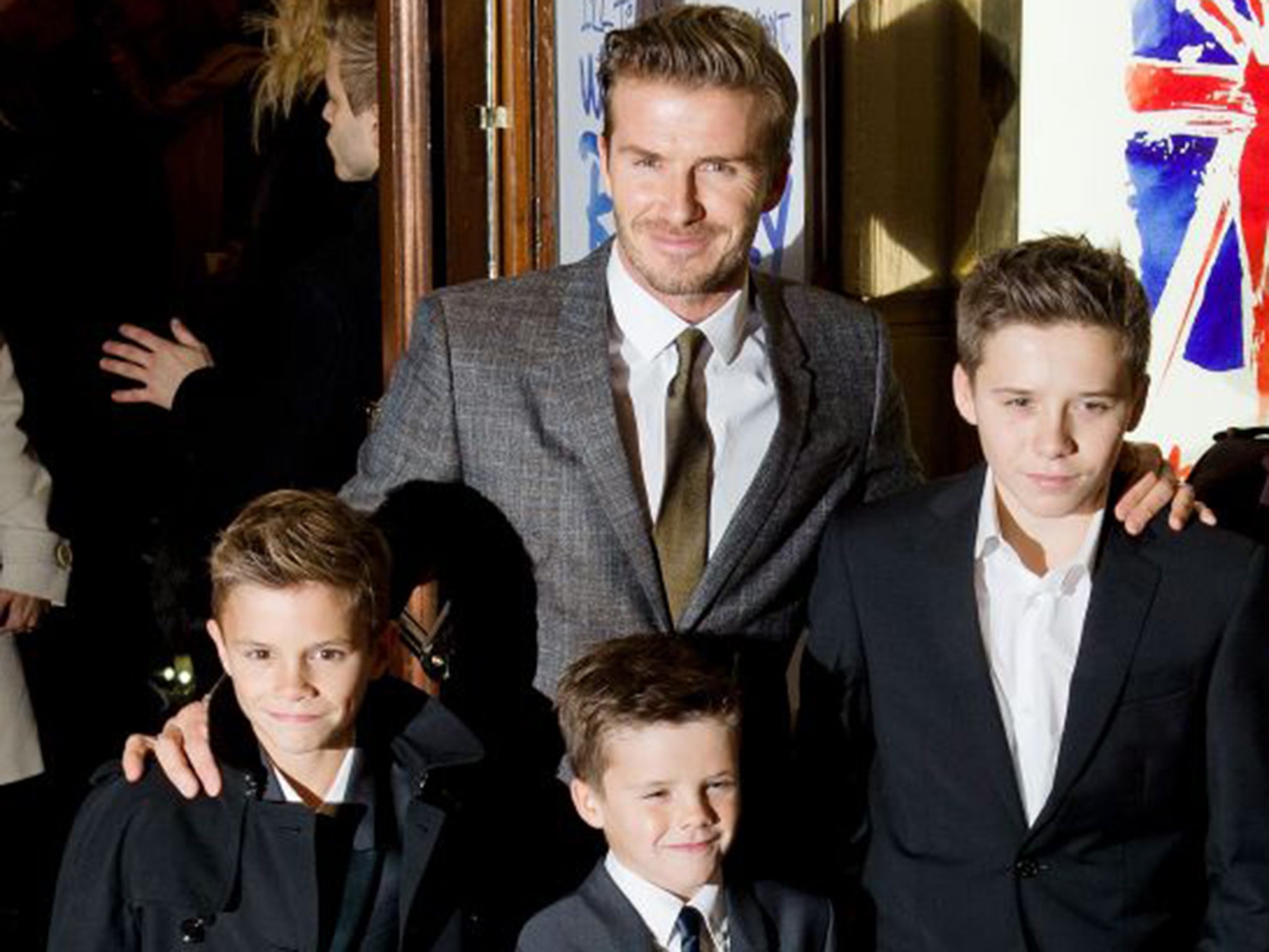 David Beckham out and about with his three sons (AFP)