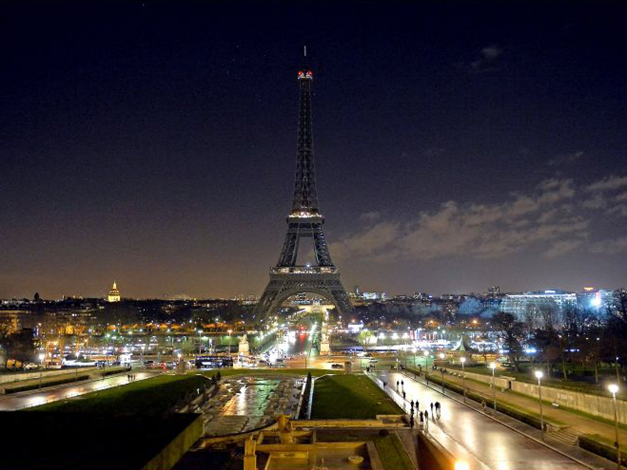 The lights of the Eiffel Tower were turned off in tribute on Thursday