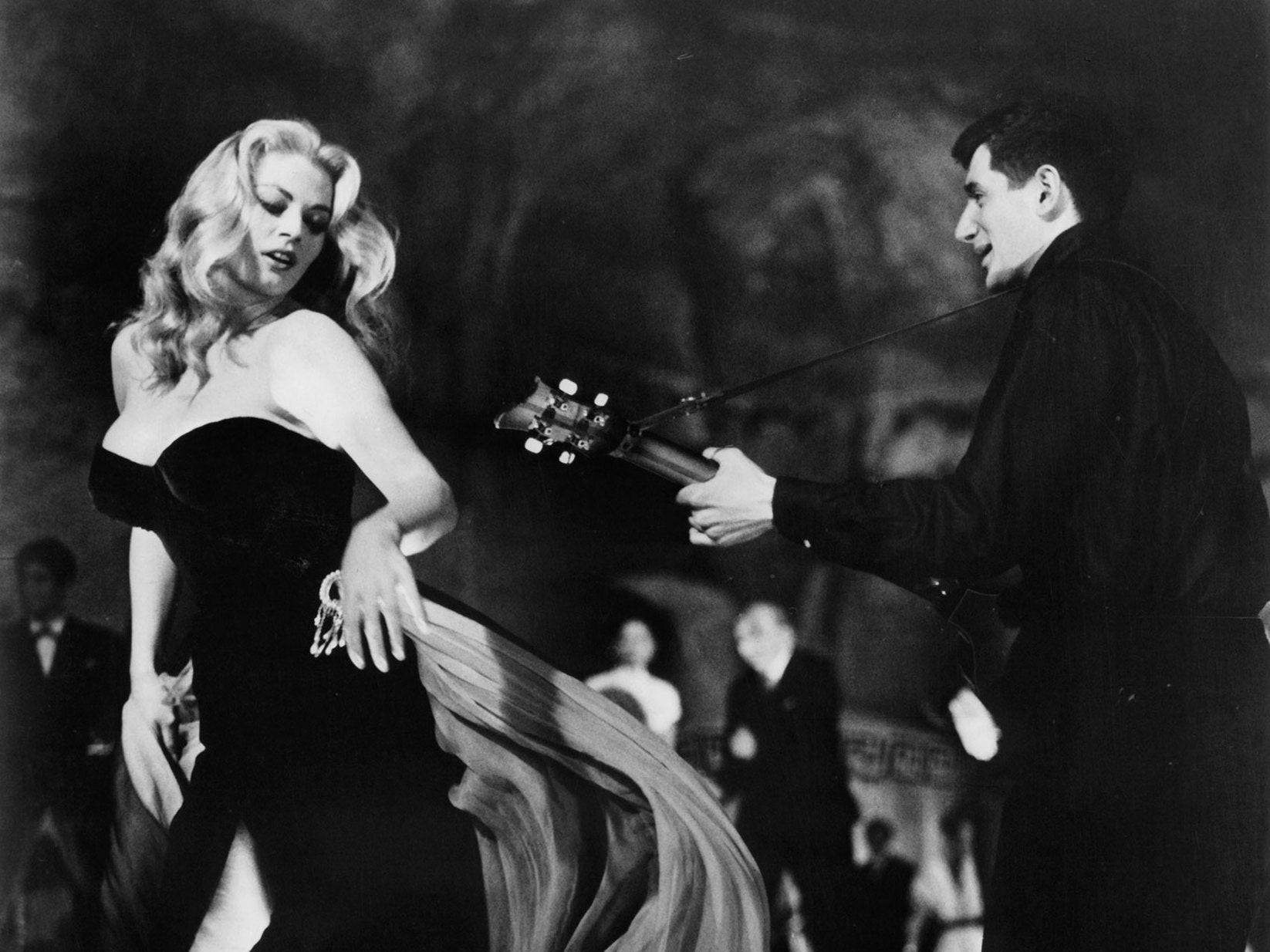 Anita Ekberg dancing in a scene from the film ‘La Dolce Vita’, 1960