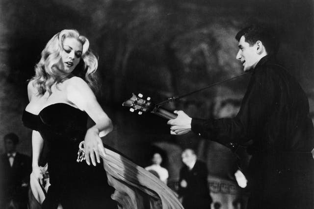 Anita Ekberg dancing in a scene from the film ‘La Dolce Vita’, 1960