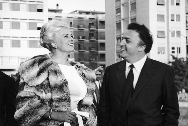 Fellini with actress Anita Ekberg, who lit up his 1959 masterpiece ‘La Dolce Vita’ – it became not only a worldwide success but a phenomenon such as the cinema has seldom known