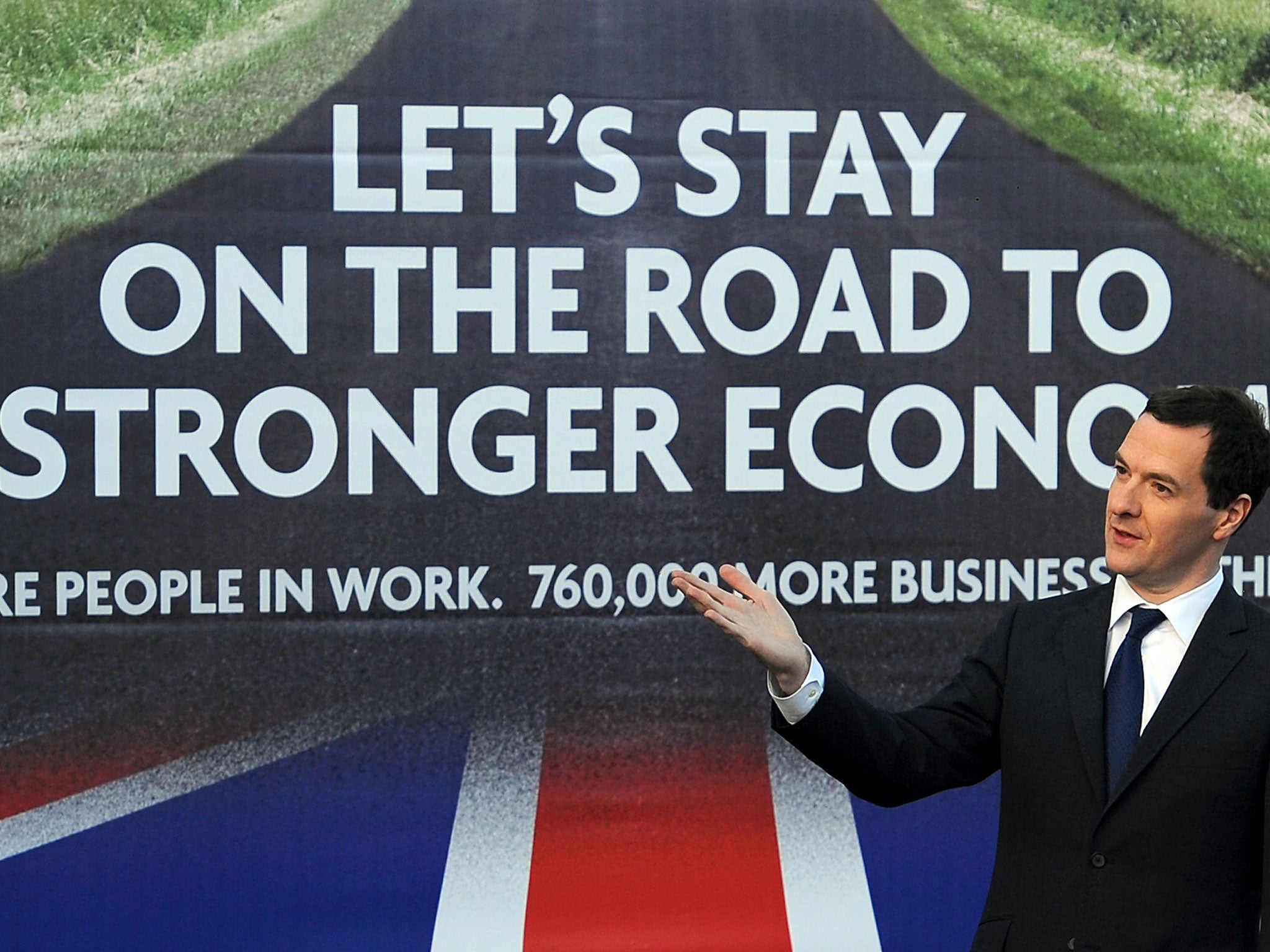 George Osborne unveiling the Conservatives’ first election poster: it actually showed a road in Germany