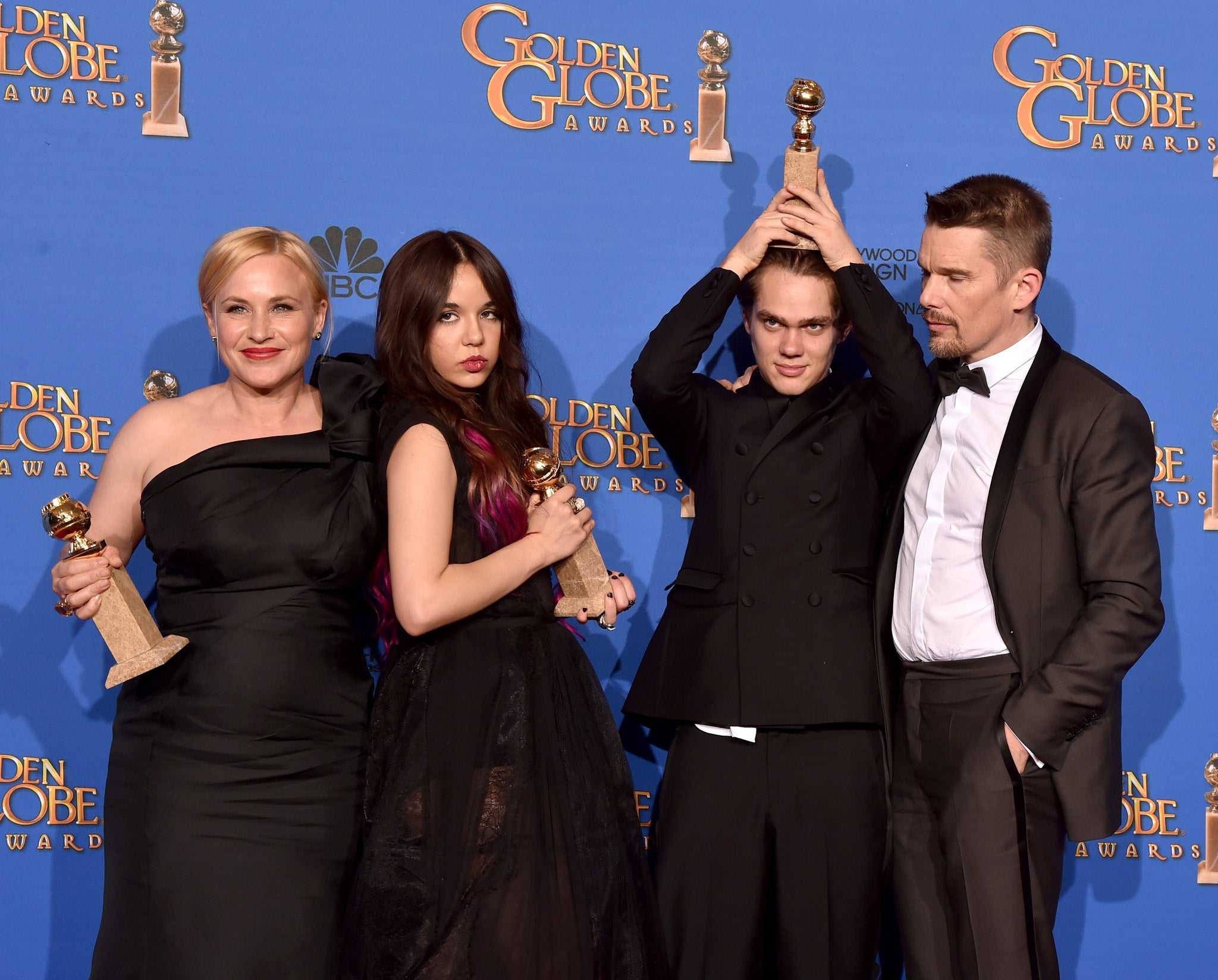 Actors Patricia Arquette, Lorelei Linklater, Ellar Coltrane, and Ethan Hawke, winners of Best Motion Picture - Drama for Boyhood, pose in the press room