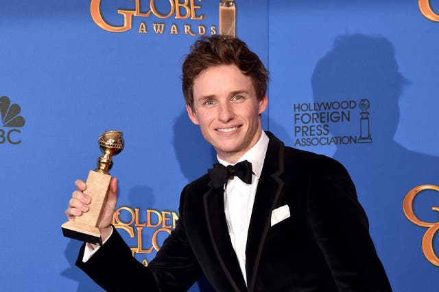 Eddie Redmayne with his Golden Globe for Best Actor in a Motion Picture (Drama) for his portrayal of Stephen Hawking