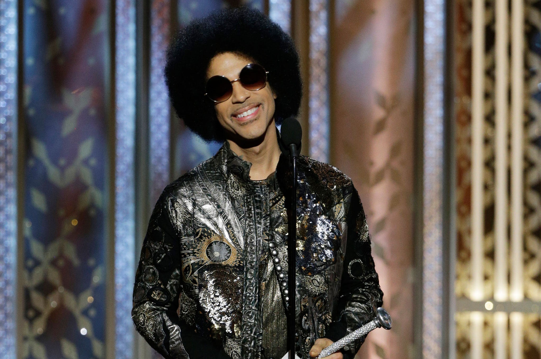 Prince speaks onstage during the 72nd Annual Golden Globe Awards at The Beverly Hilton Hotel