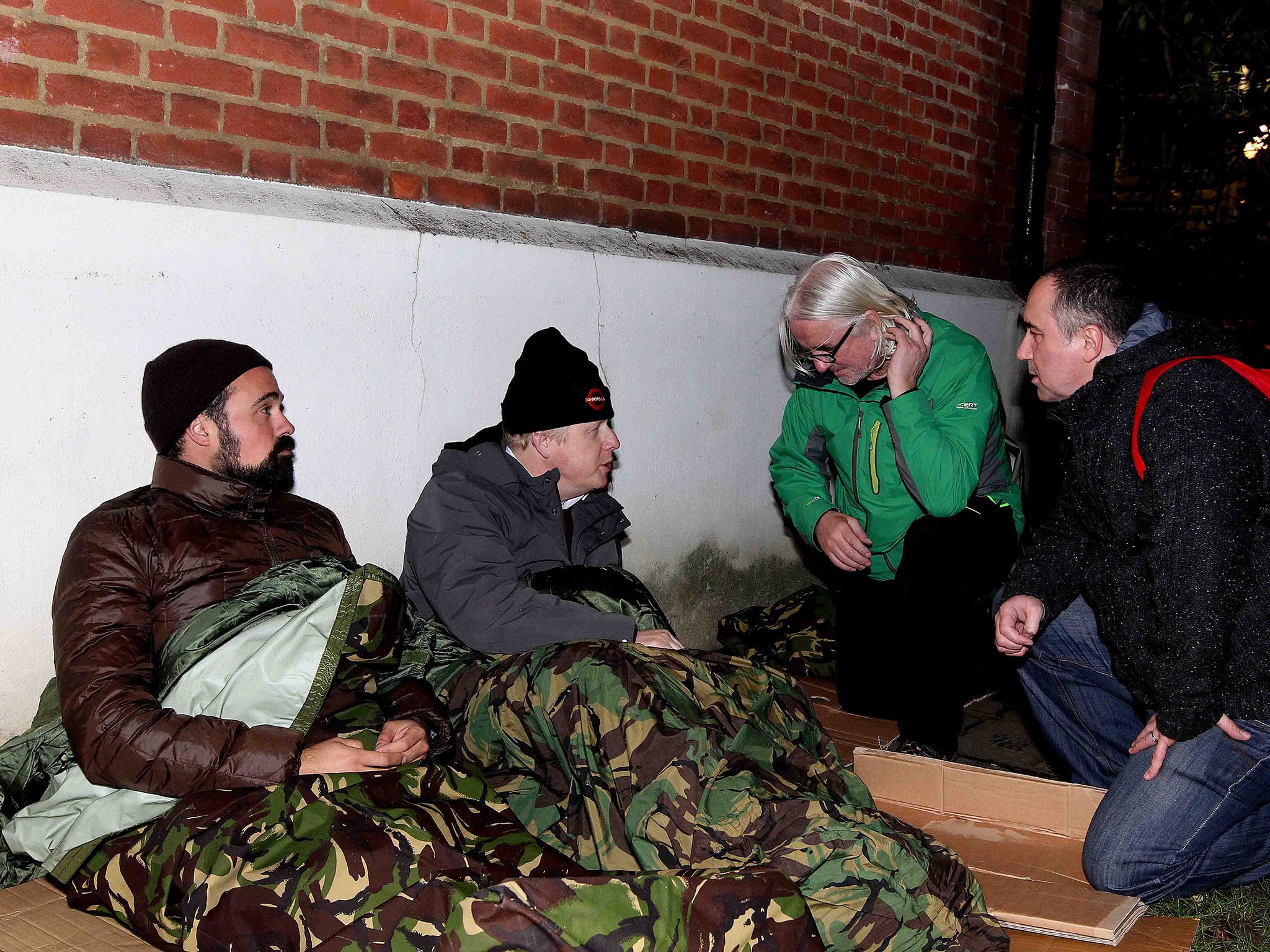 Evgeny Lebedev (left) and Boris Johnson (second left), approached by Joe & Chris from St Mungos Broadway Outreach Team