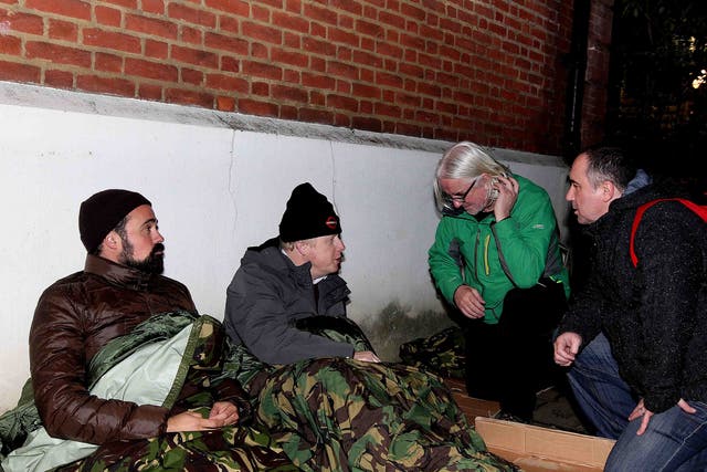 Evgeny Lebedev (left) and Boris Johnson (second left), approached by Joe & Chris from St Mungos Broadway Outreach Team 