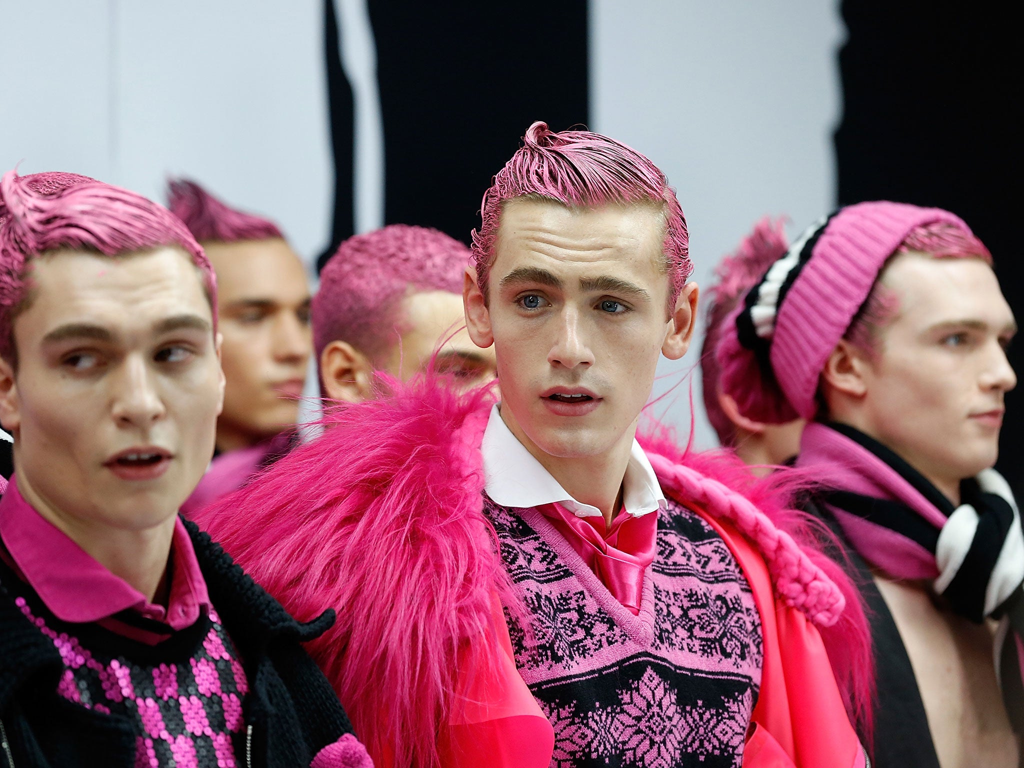 Models walk the runway during the Sibling show at the London Collections: Men AW15 at Victoria House in London