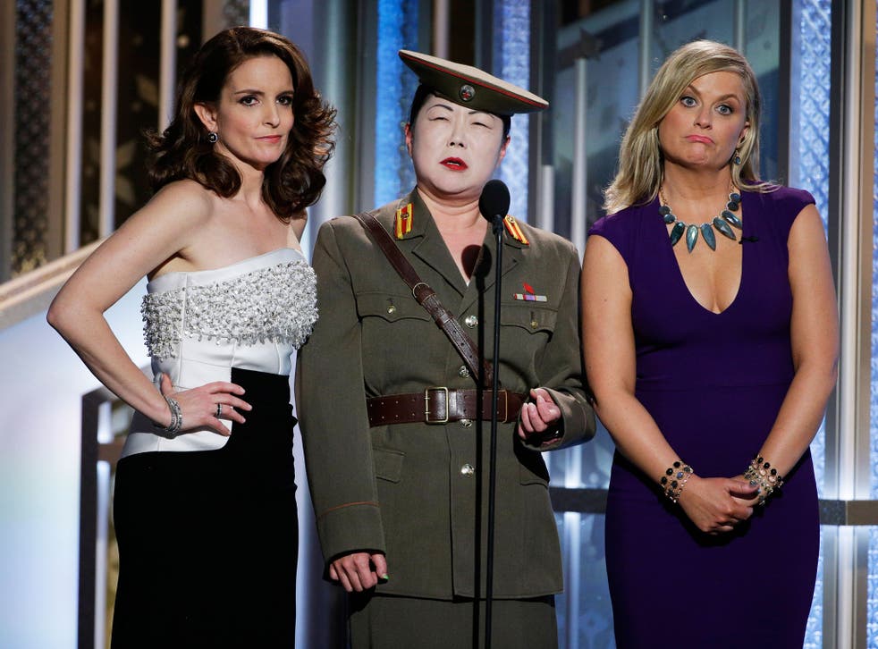 Tina Fey, Margaret Cho and Amy Poehler  onstage during the 72nd Annual Golden Globe Awards